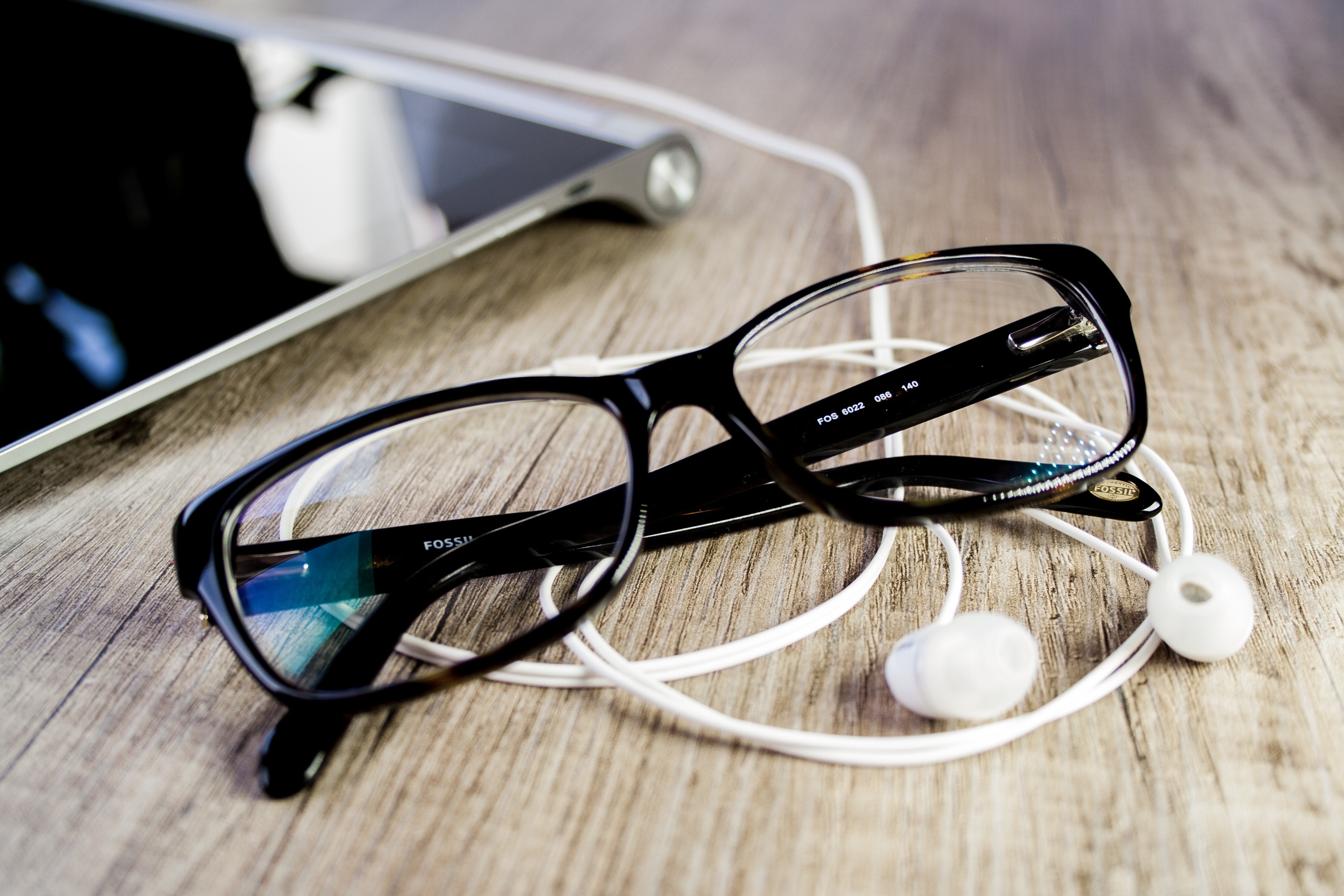 Close-up of eyeglasses on table photo