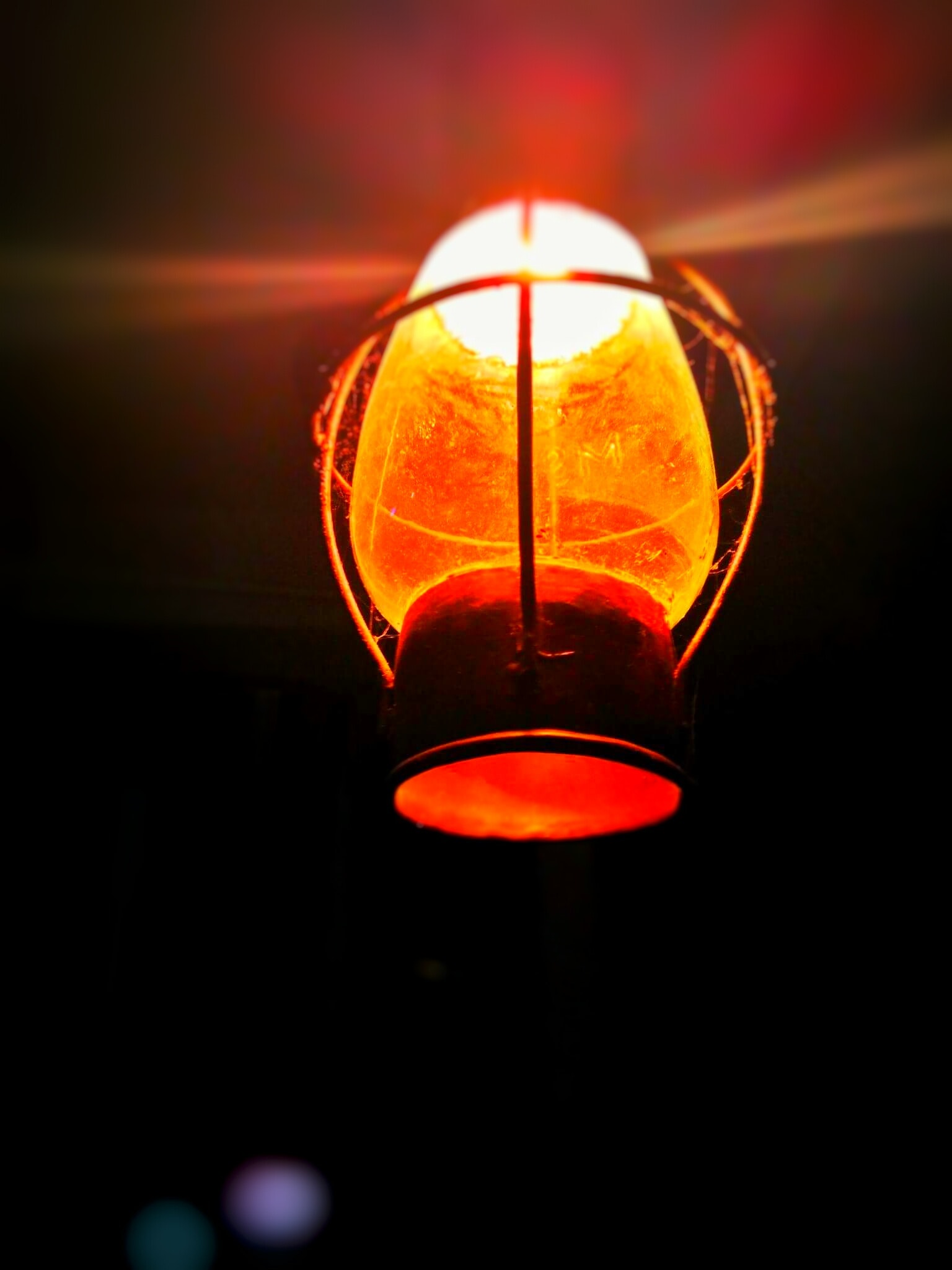 Close-up of illuminated lantern at night photo