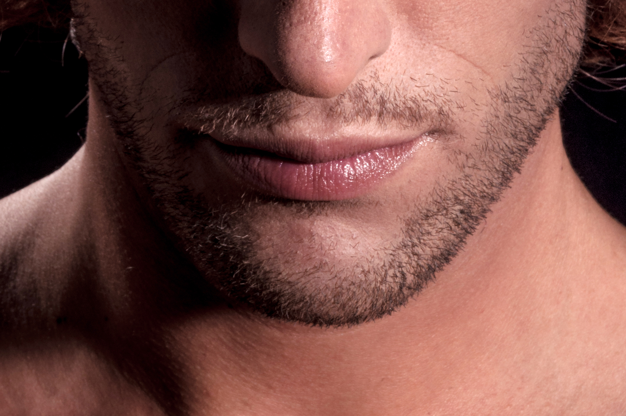 Close up of man lips, beard and face photo