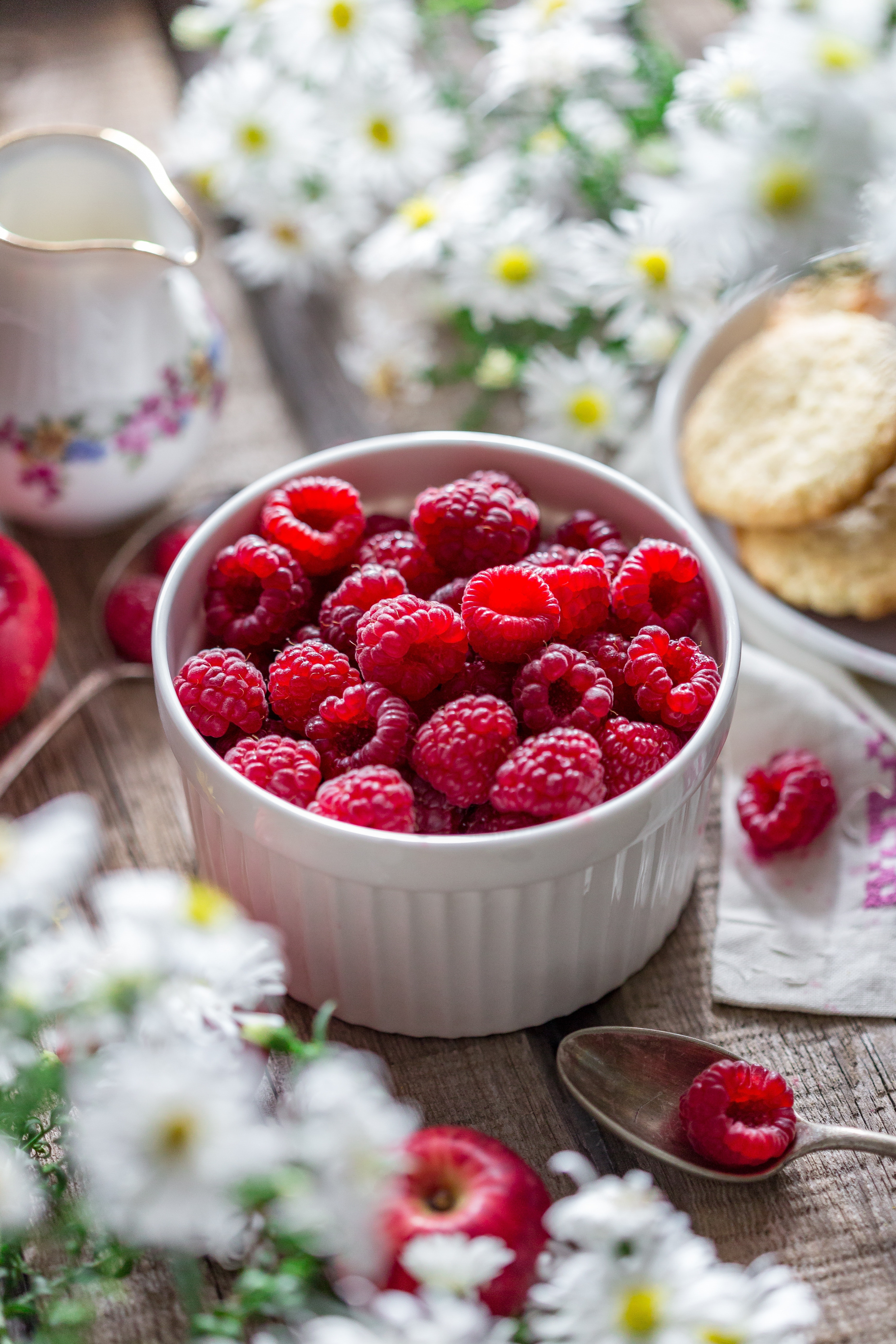 Close-up of raspberries in bowl on table photo