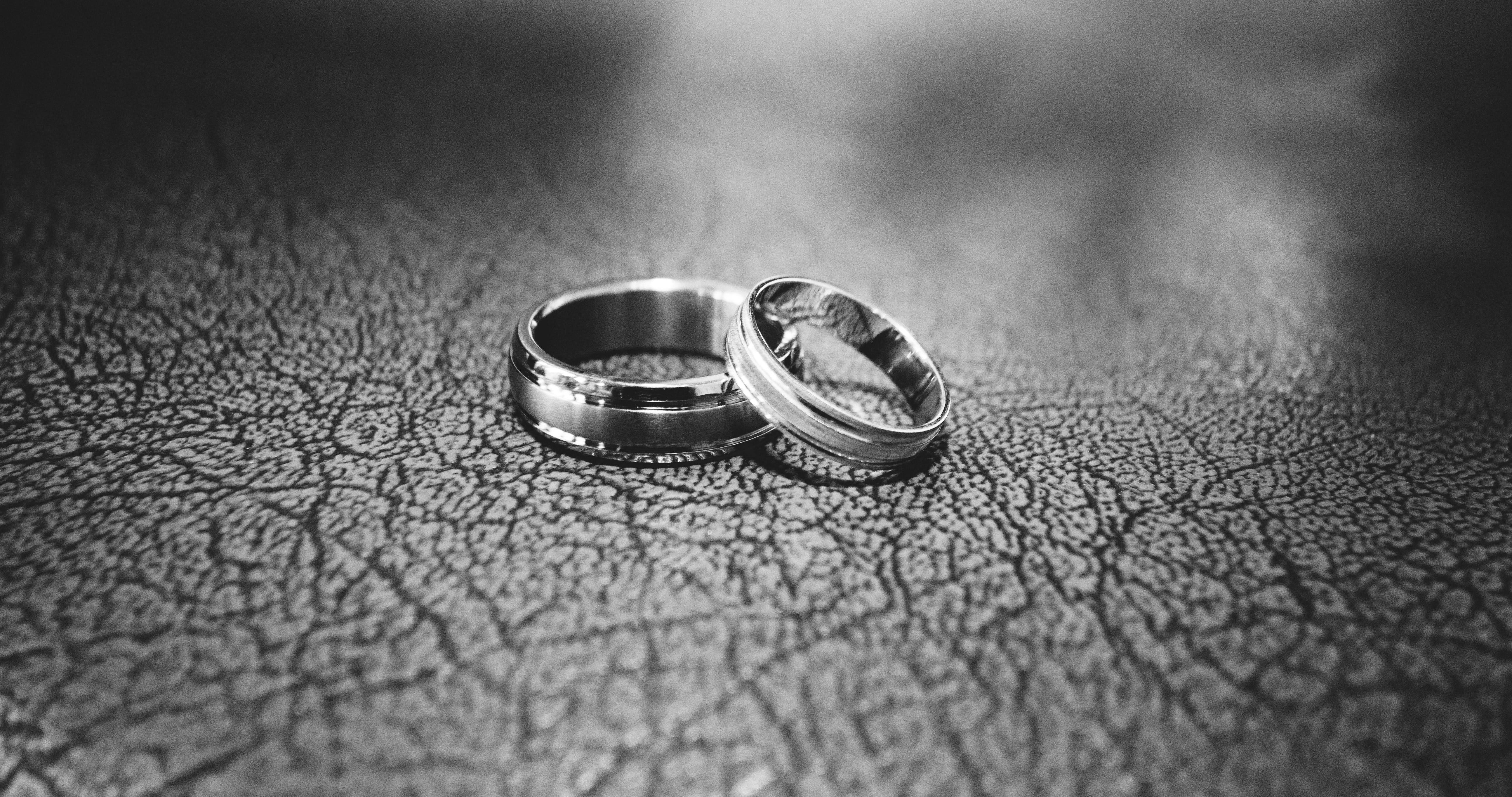 Close-up of wedding rings on floor photo