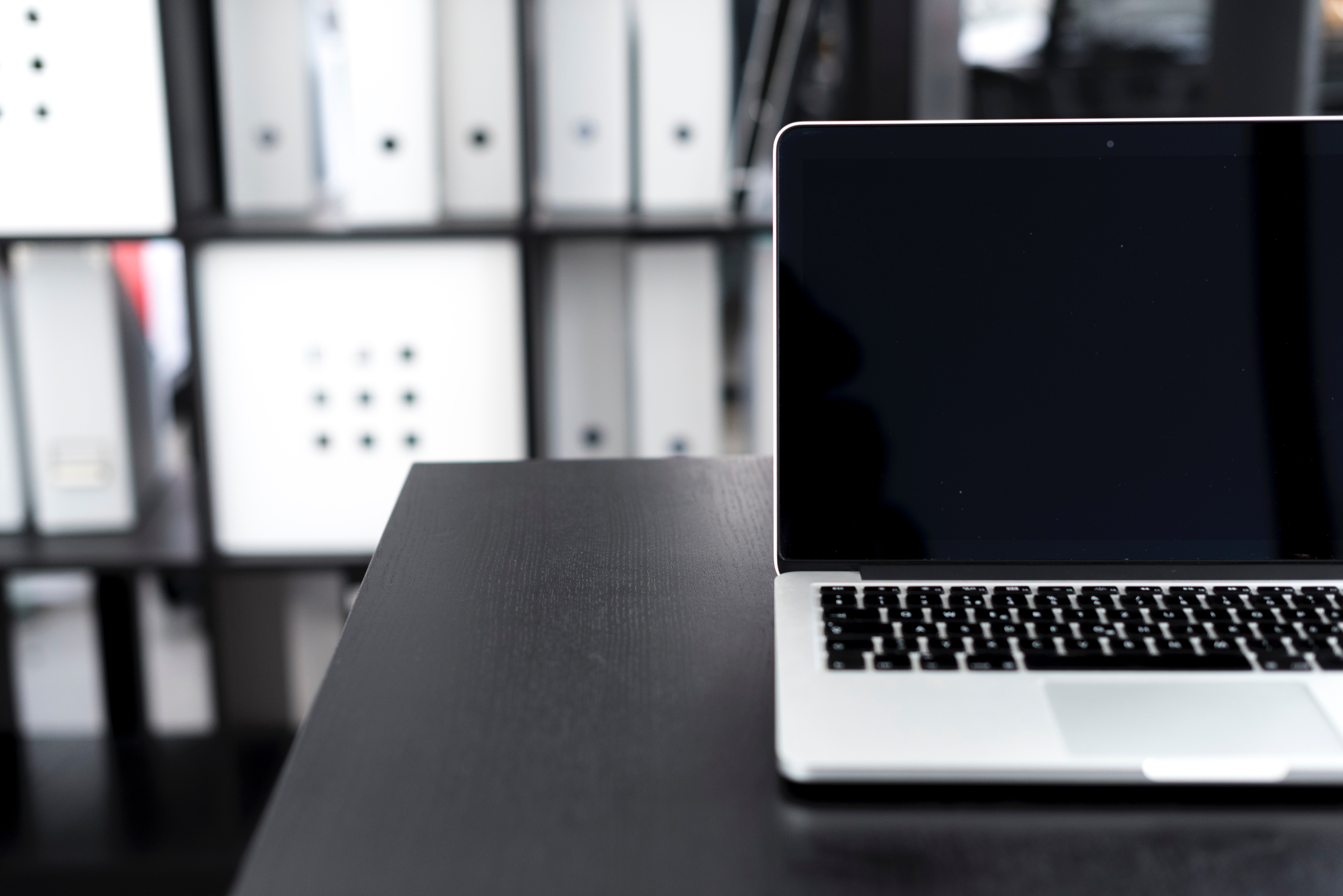 Close Up Photo of a Silver Macbook, Black and white, Blurred background, Desk, Electronics, HQ Photo