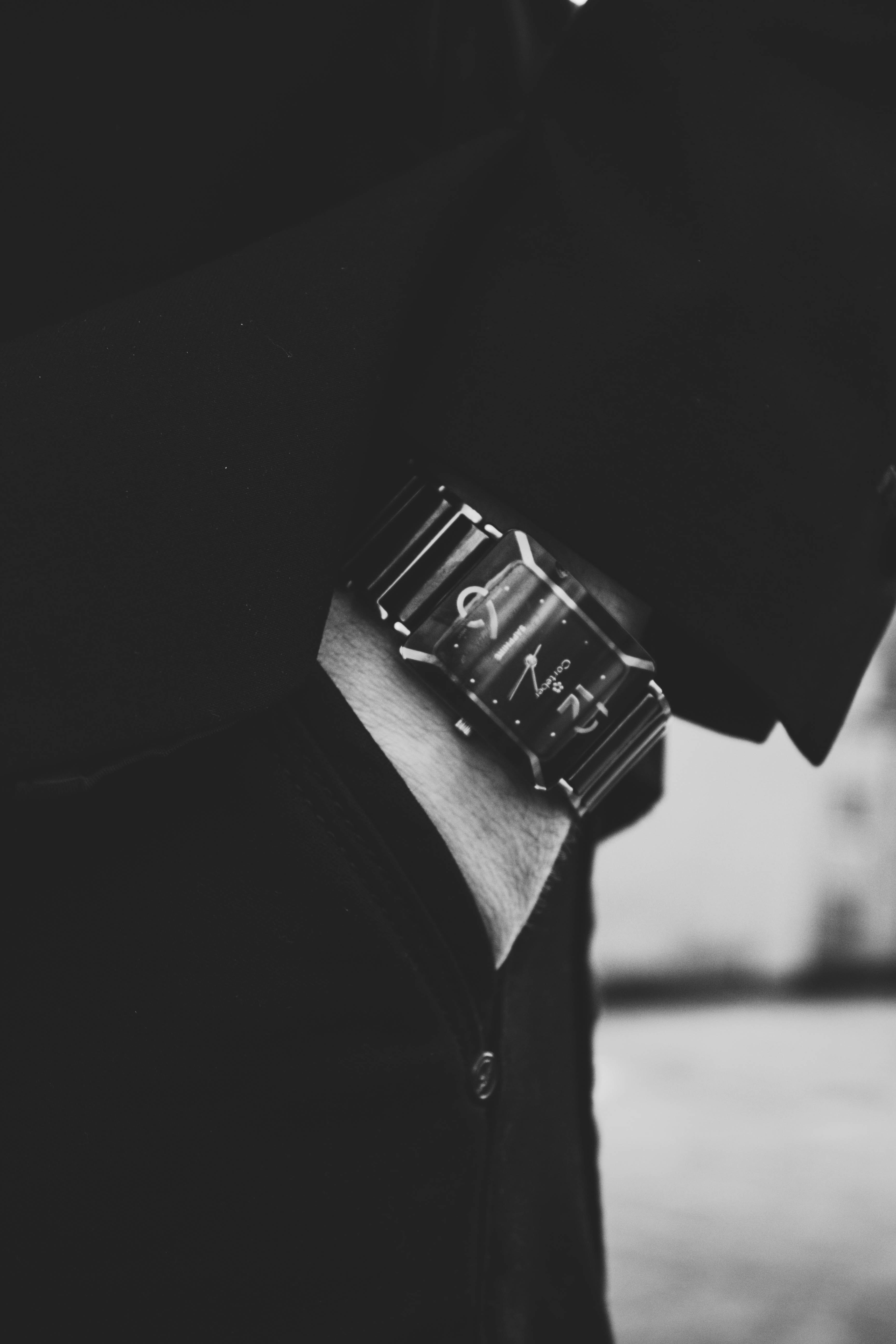 Close-up view of man wearing black watch photo