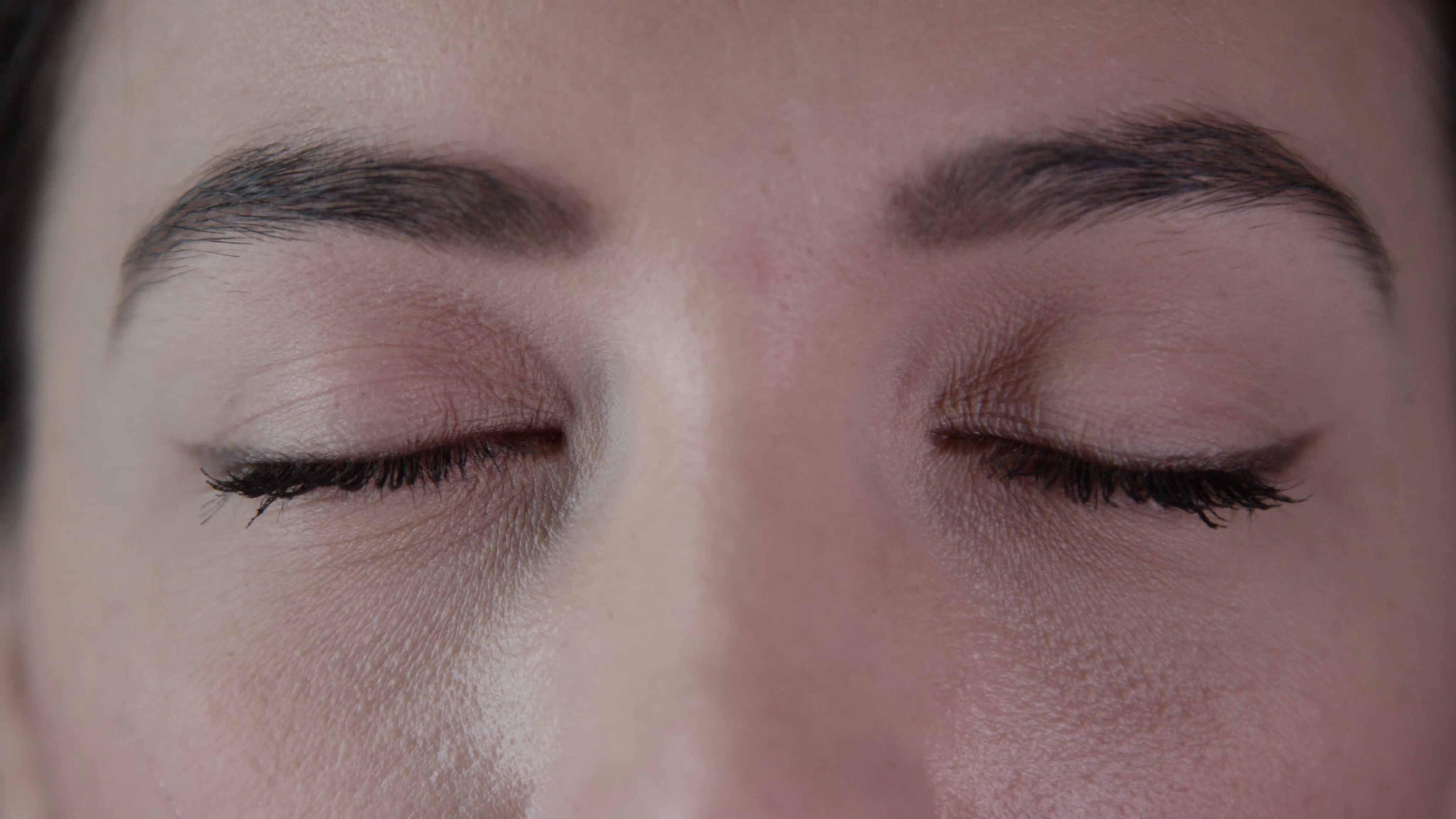4K Close up on the closed eyes of a beautiful young woman - Beauty ...