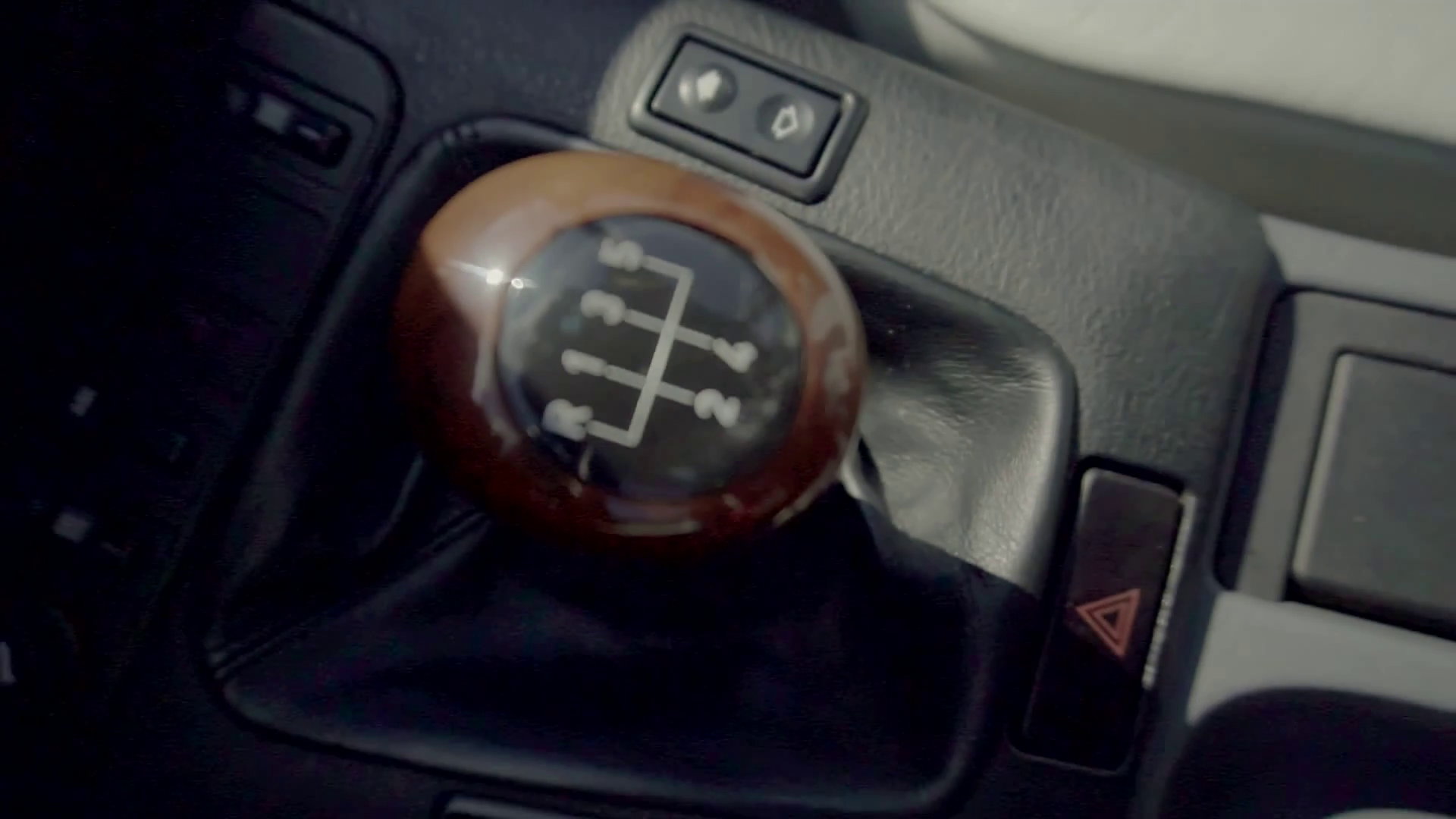 close up high angle video shot of a manual car gear stick with the ...