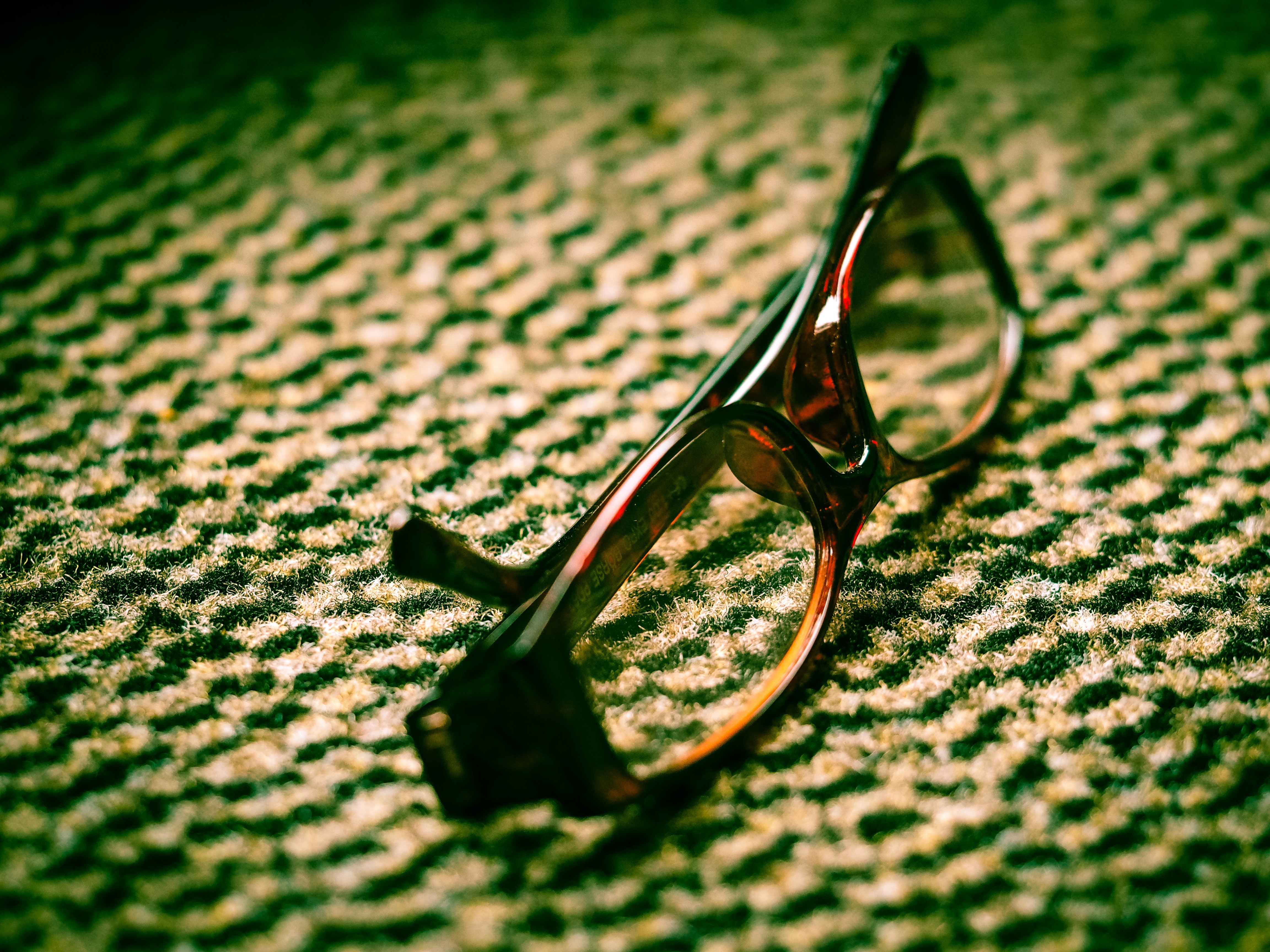 Close-up Photography of Eyeglasses at Golden Hour · Free Stock Photo