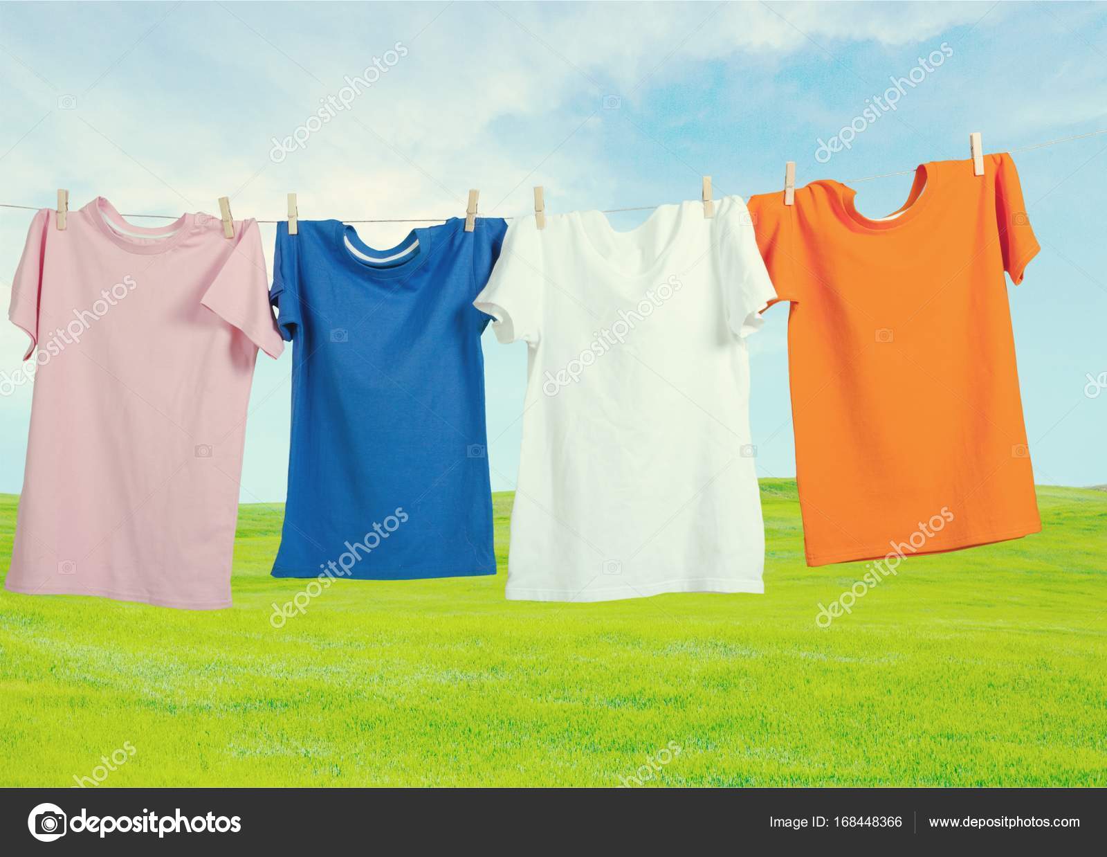 Wash clothes on a rope with clothespins — Stock Photo ...