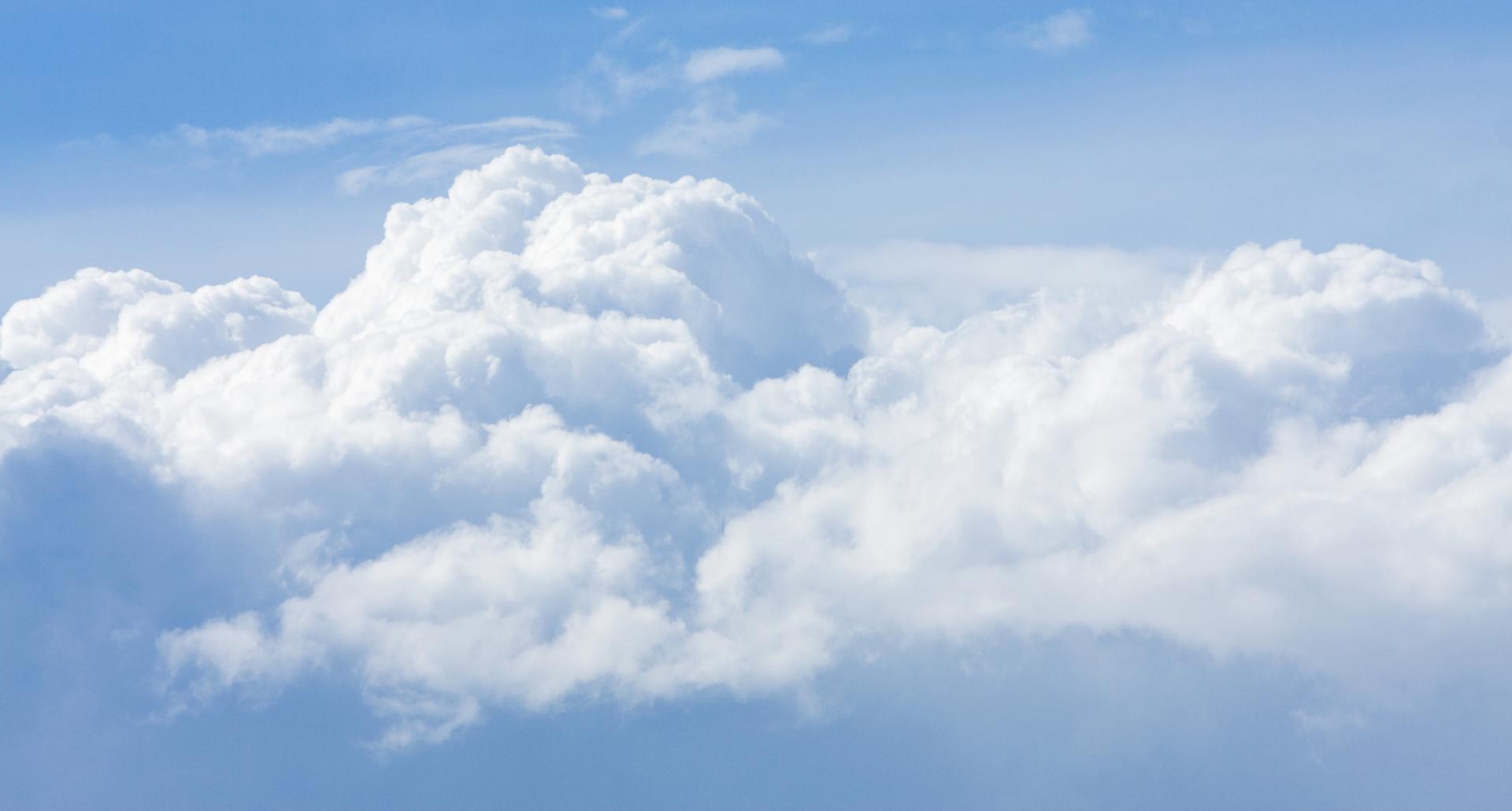 Fluffy clouds background photo