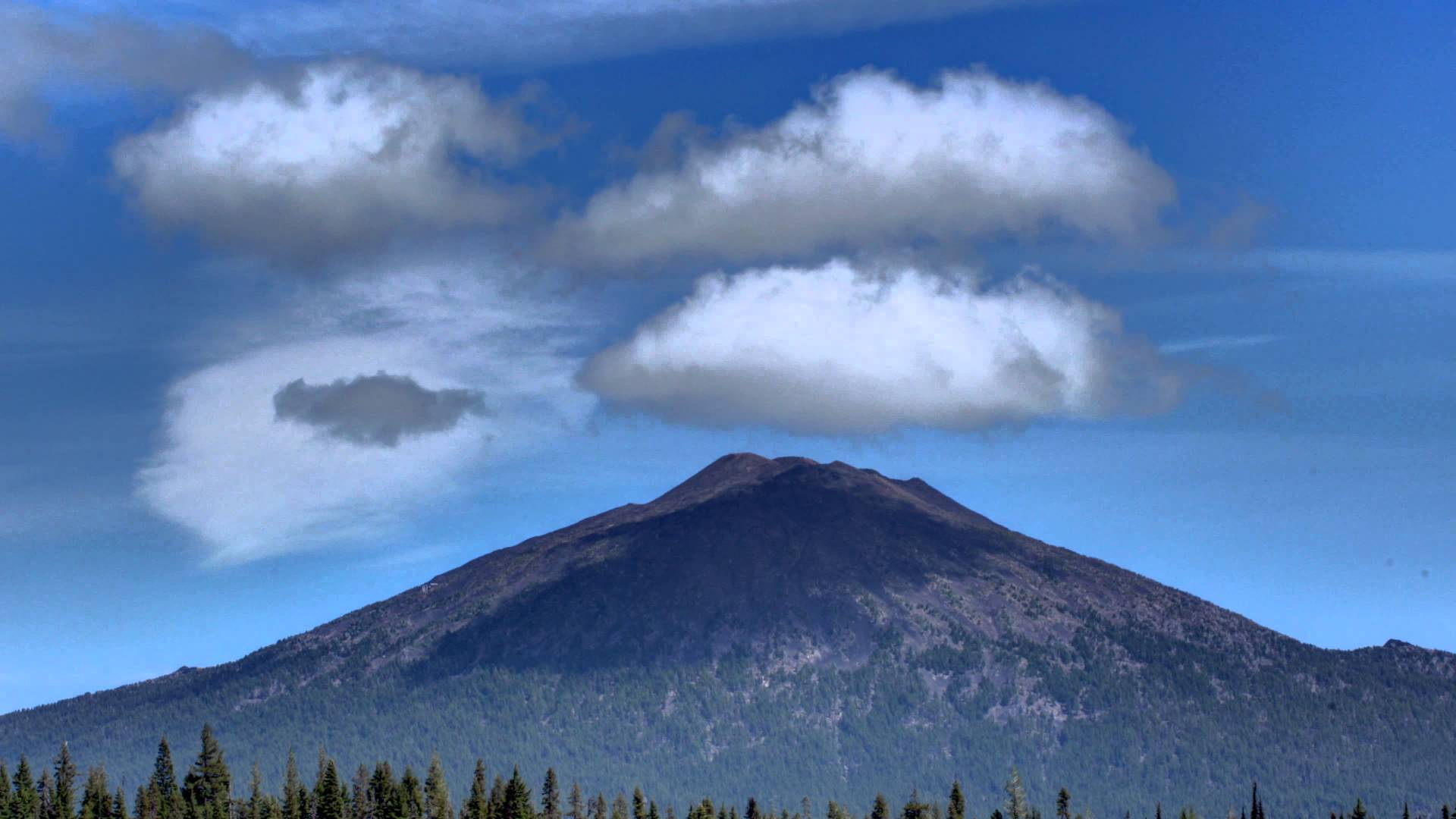 Clouds over mountain Timelapse - YouTube