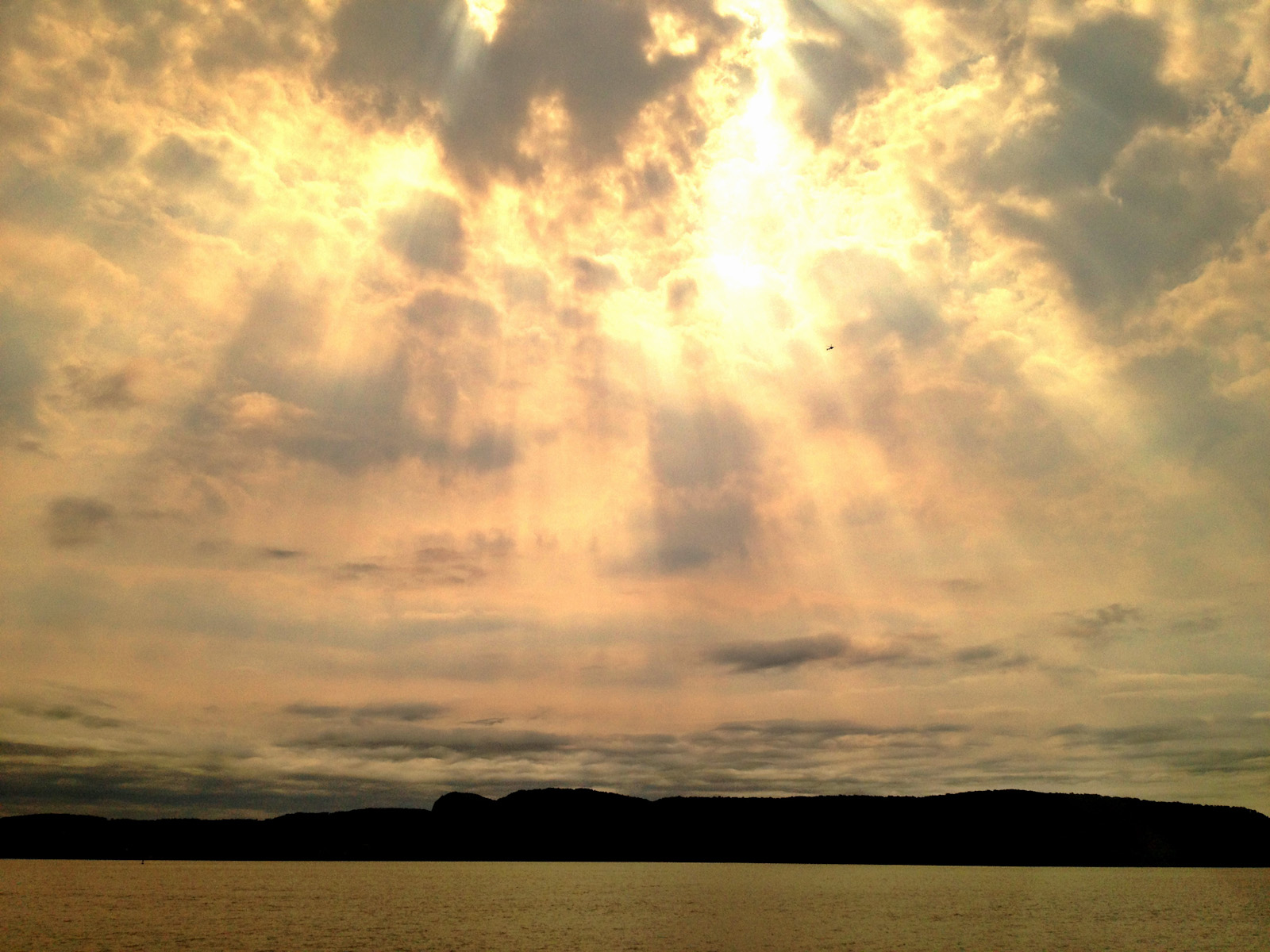 Sun Streaming Through Clouds Over the Hudson | Cuteness, in all its ...