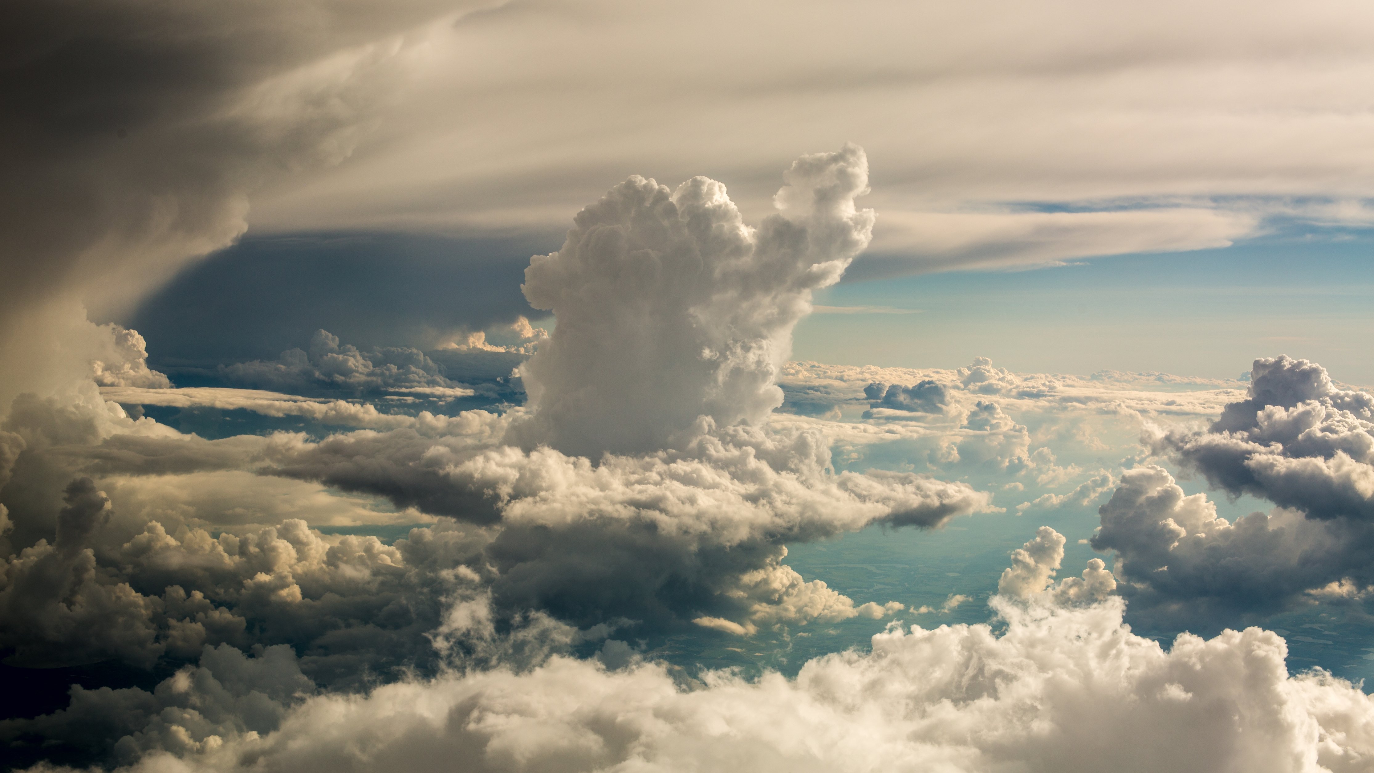 cloudy-sky-from-above_4460x4460 - Old Peak Finance