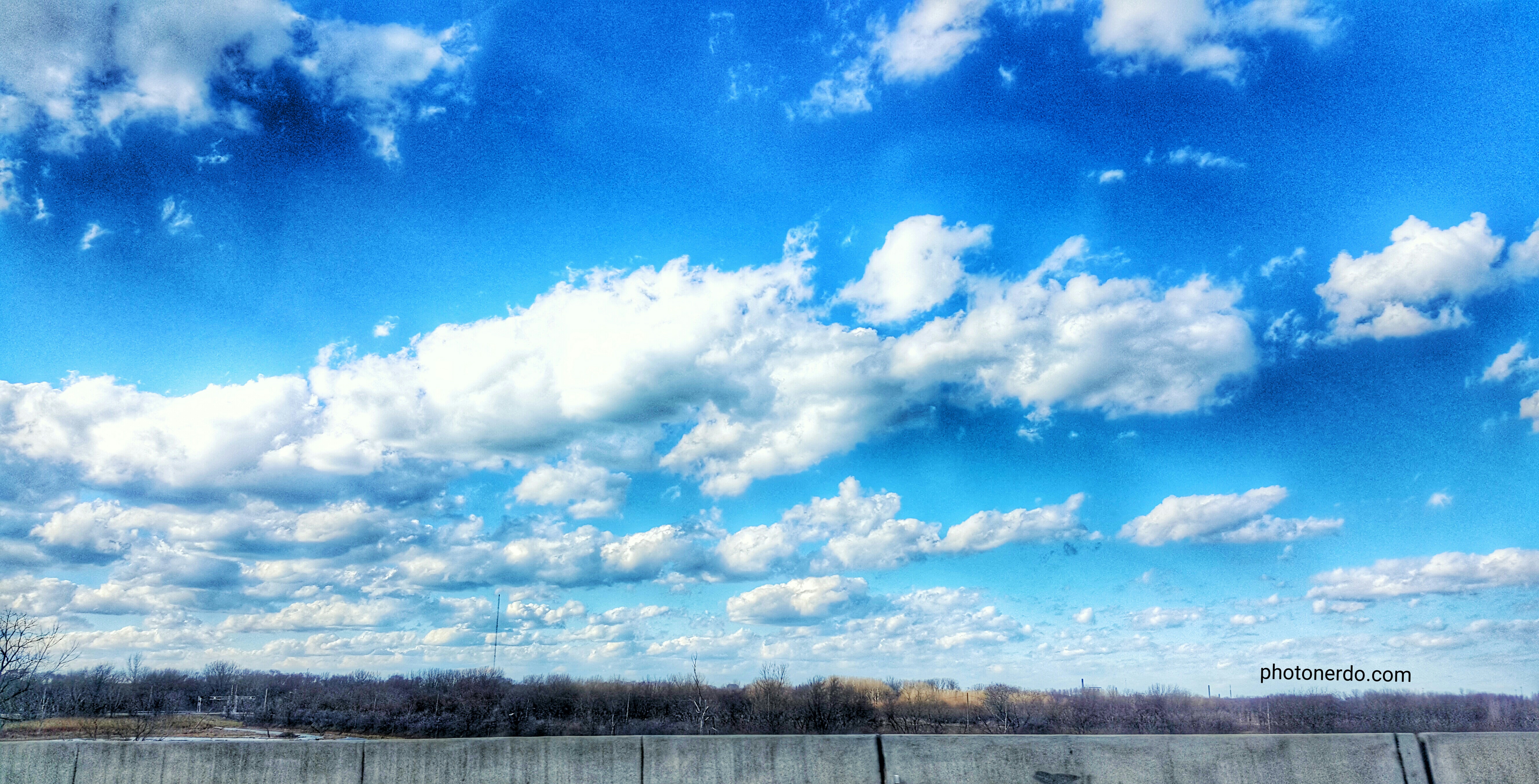 Cloudy blue sky - PhotoNerdo