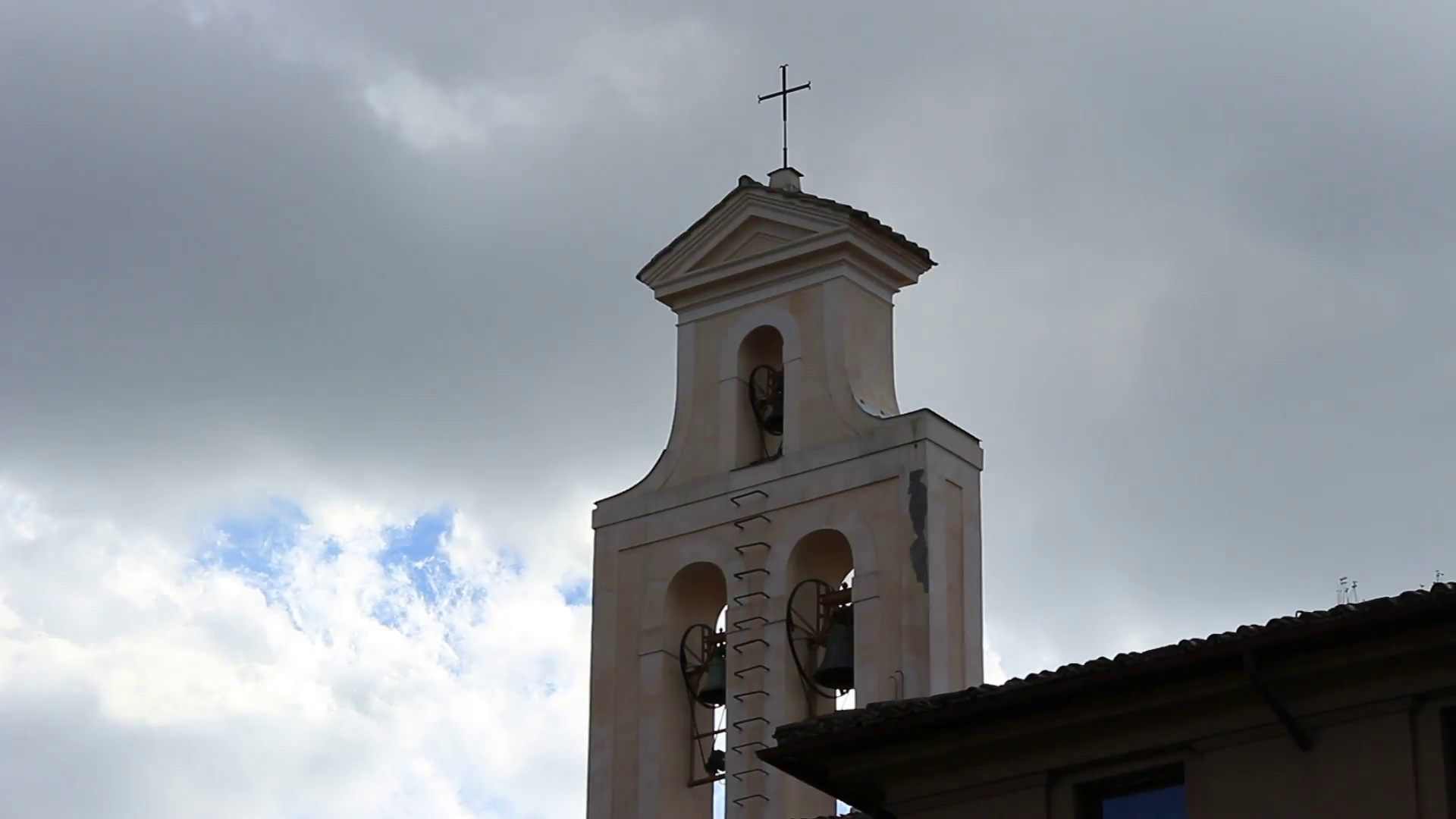Cloudy church tower photo