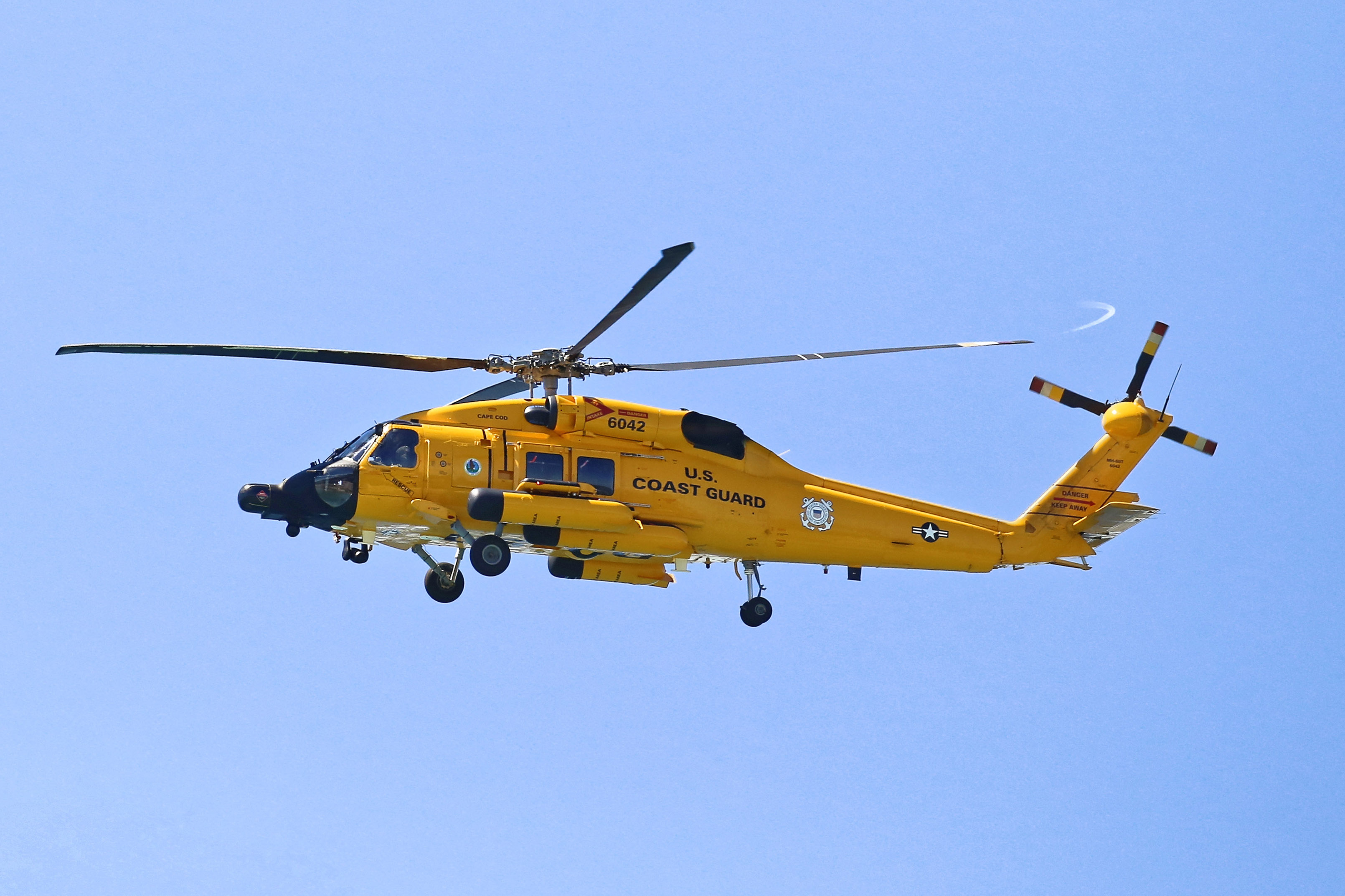 Yellow US Coast Guard Helicopter in Ludington, MI [OC] : aviation