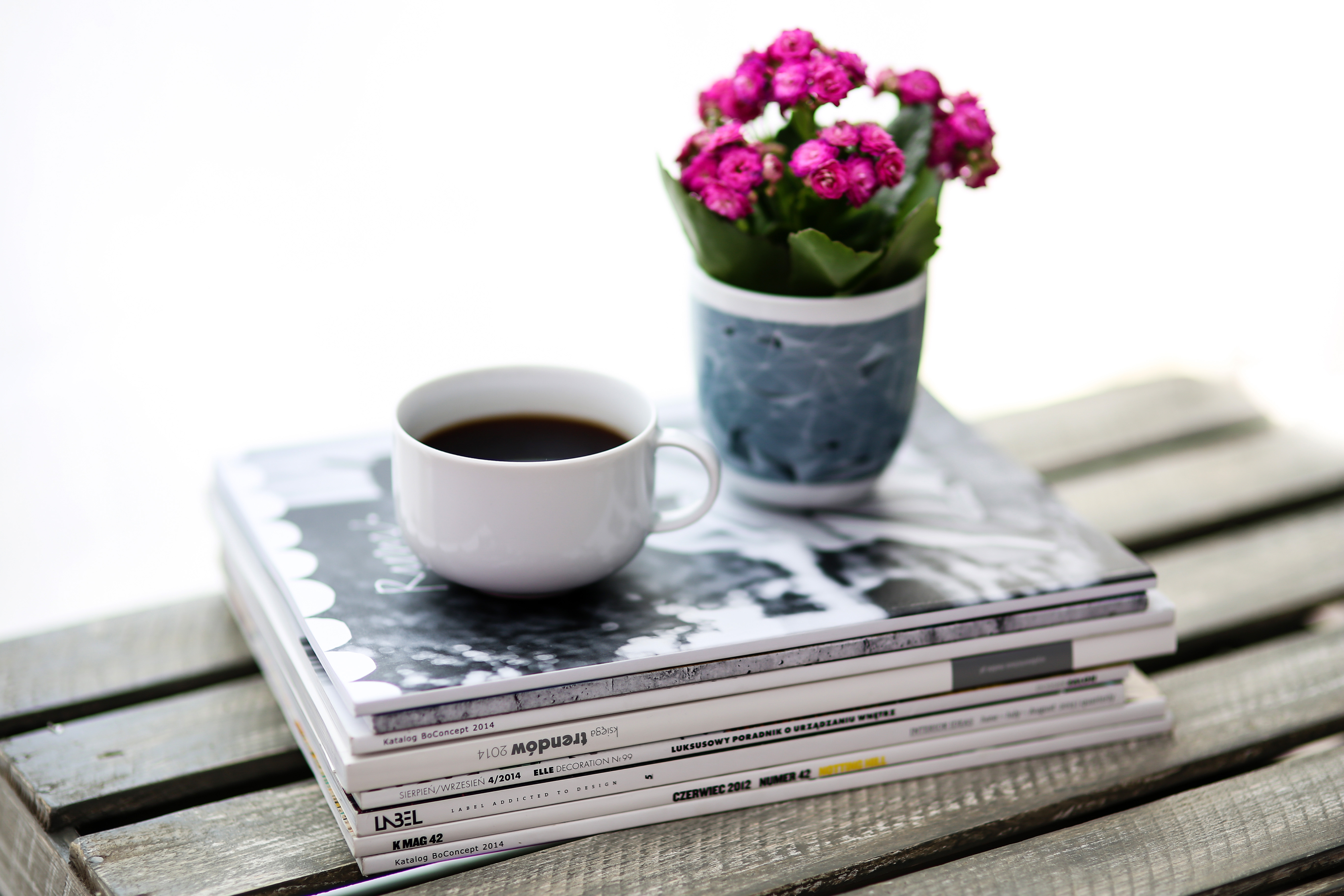 Coffee and flowers sitting on a stack of books image - Free stock ...