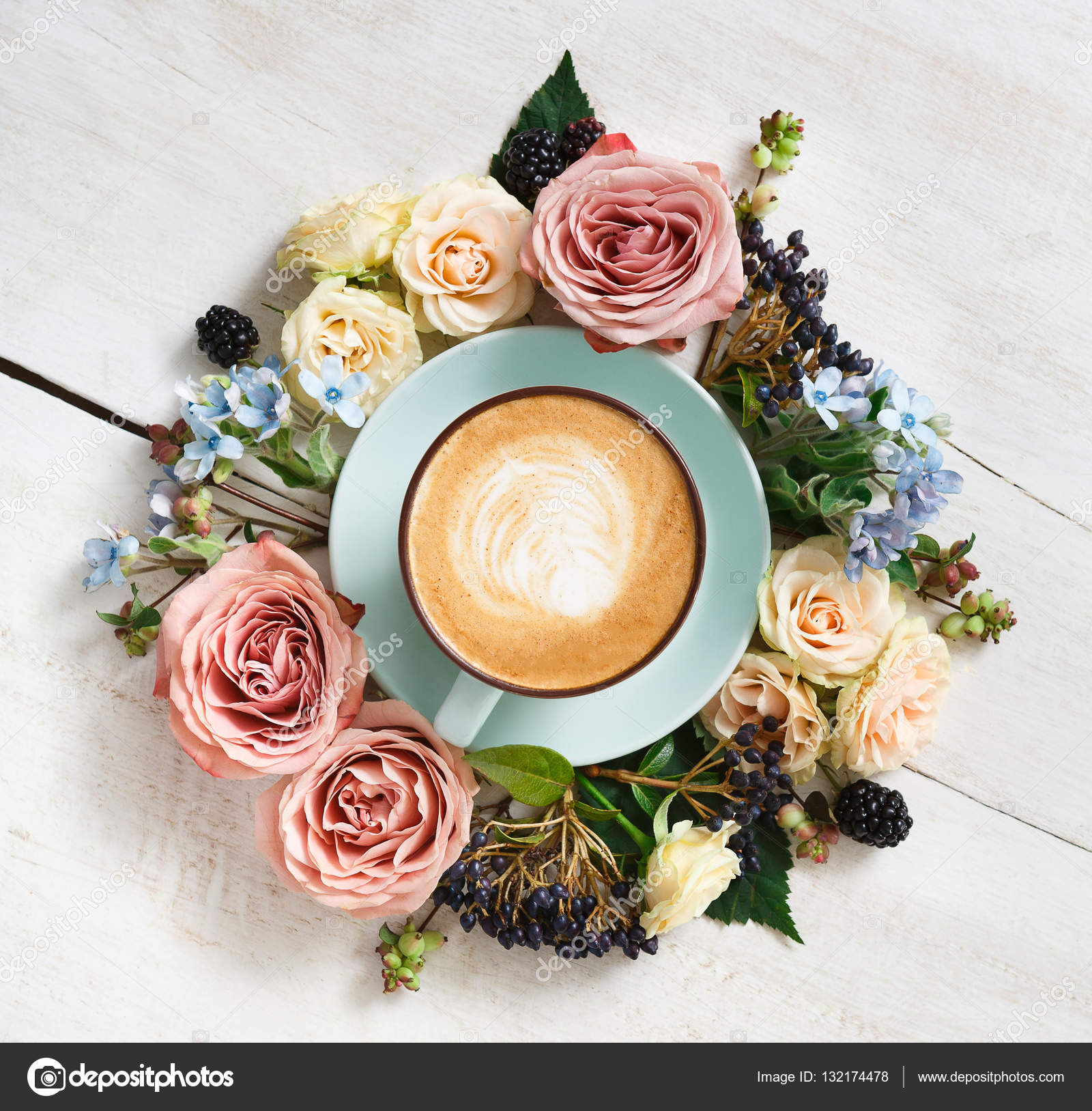 Cappuccino coffee and flowers composition on white wood — Stock ...