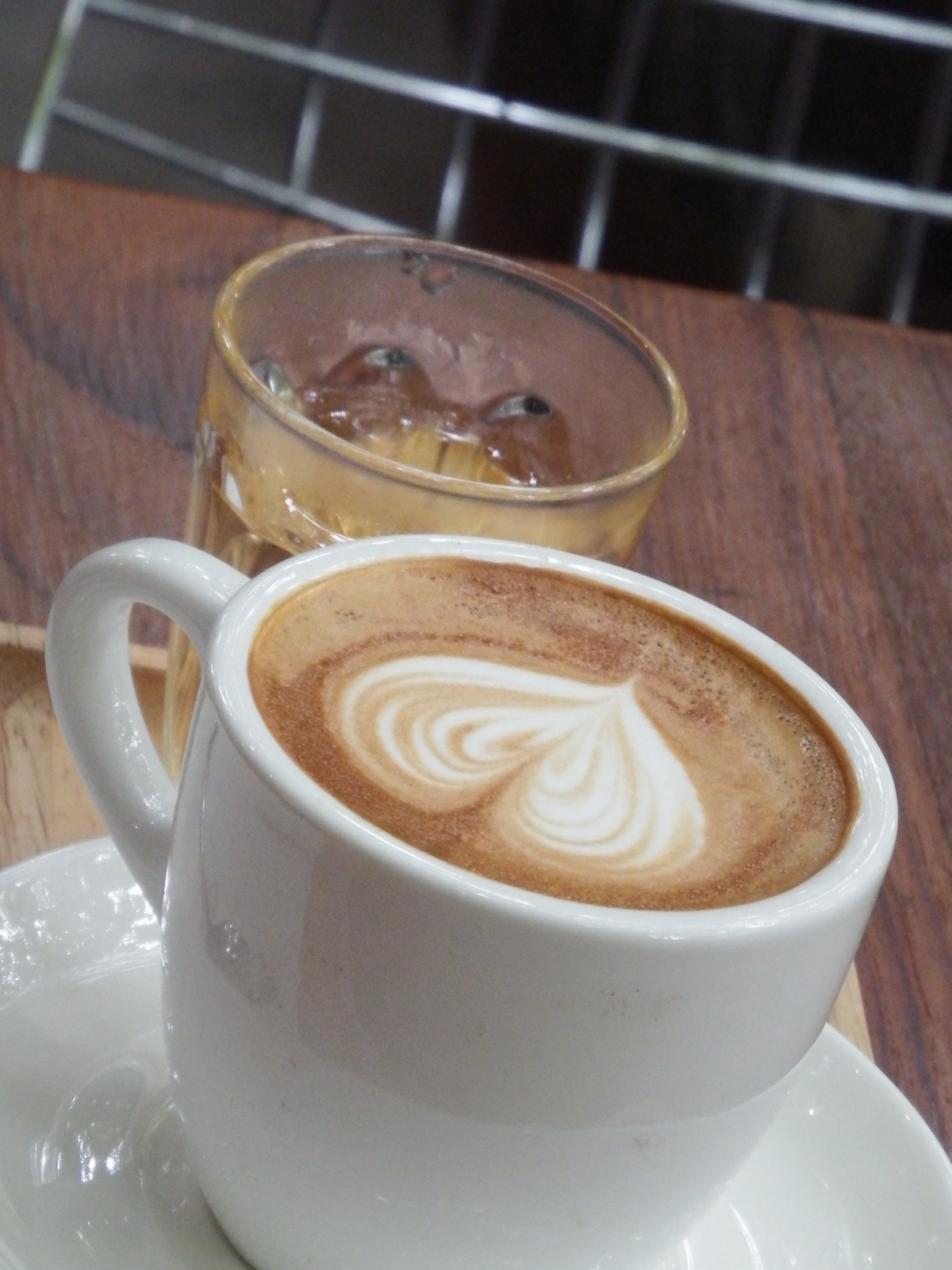 Coffee and iced tea with heart art photo