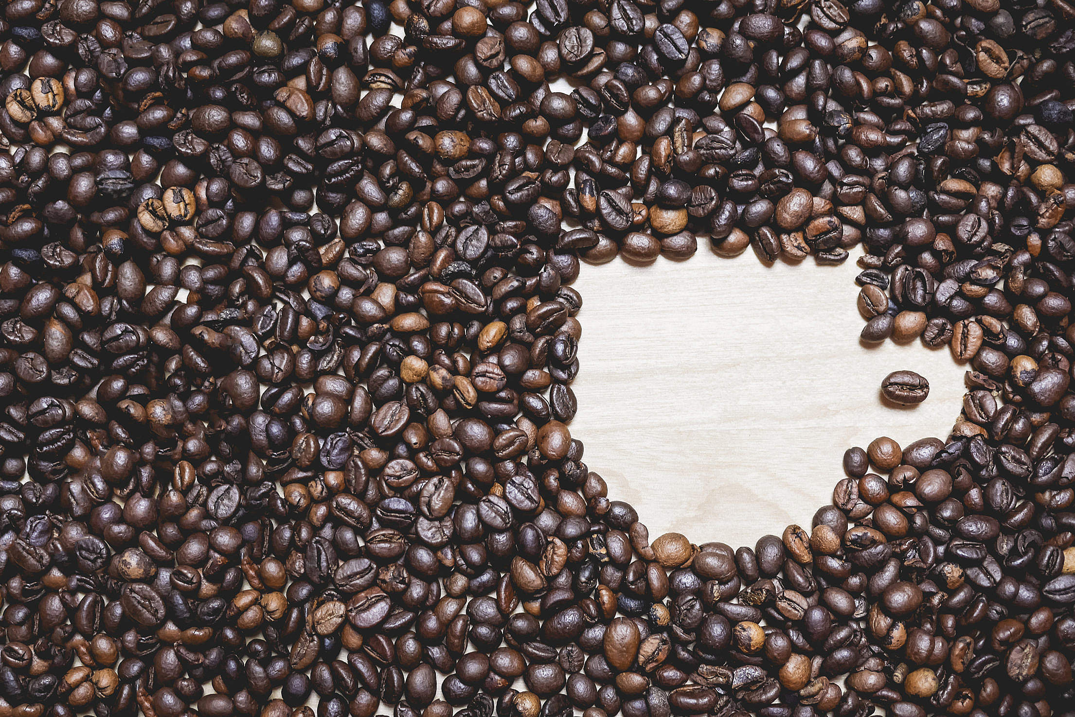 Coffee Cup Shape in Coffee Beans Free Stock Photo Download | picjumbo