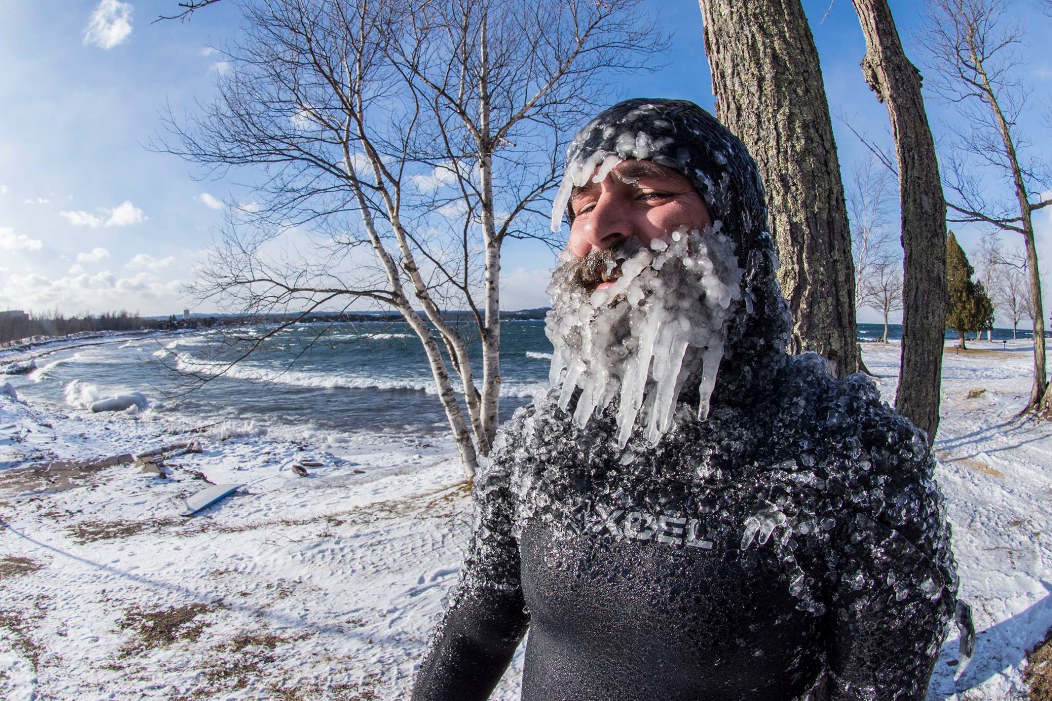 Brutal cold doesn't keep surfer from catching waves on the Great ...
