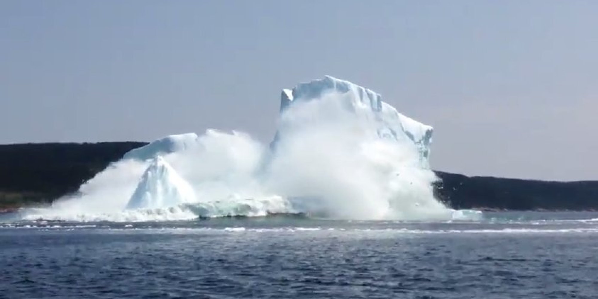 Collapsing iceberg photo