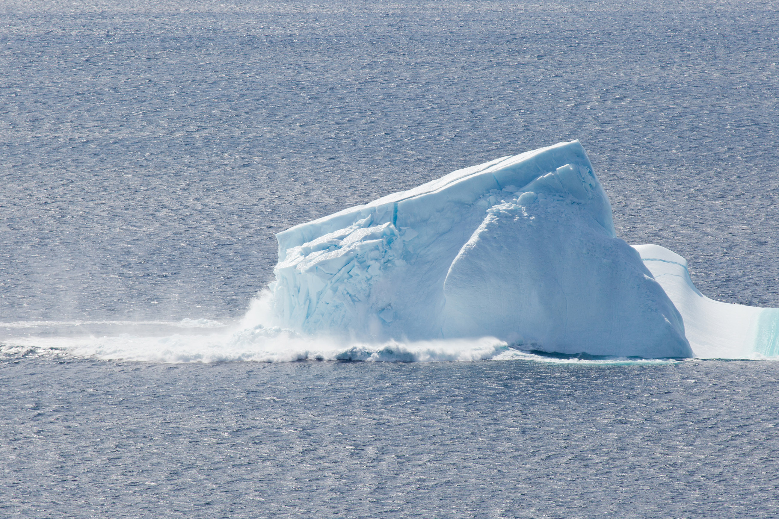 Collapsing iceberg photo