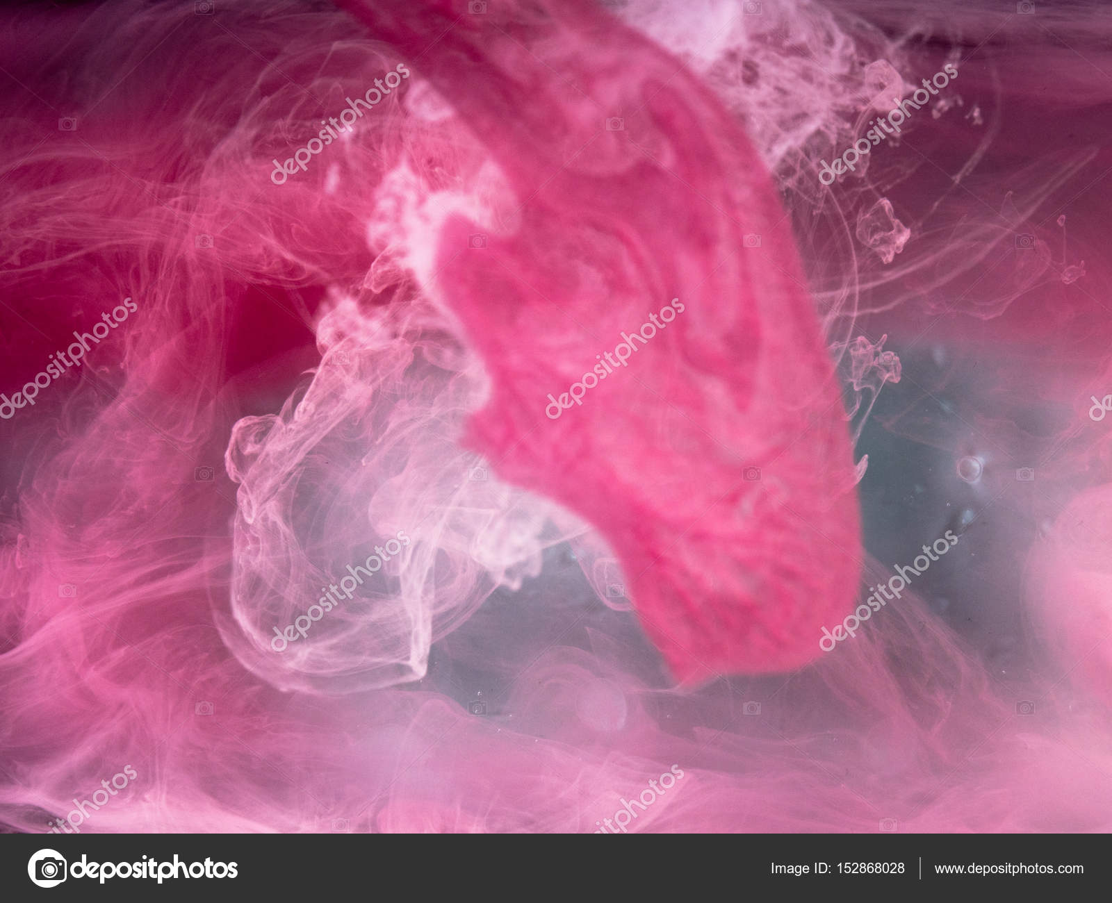 Abstract colored background. Colored smoke, ink in water, the ...