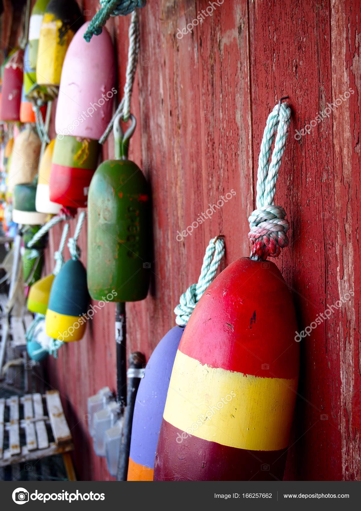 Colorful buoys on red wall — Stock Photo © alexat25 #166257662