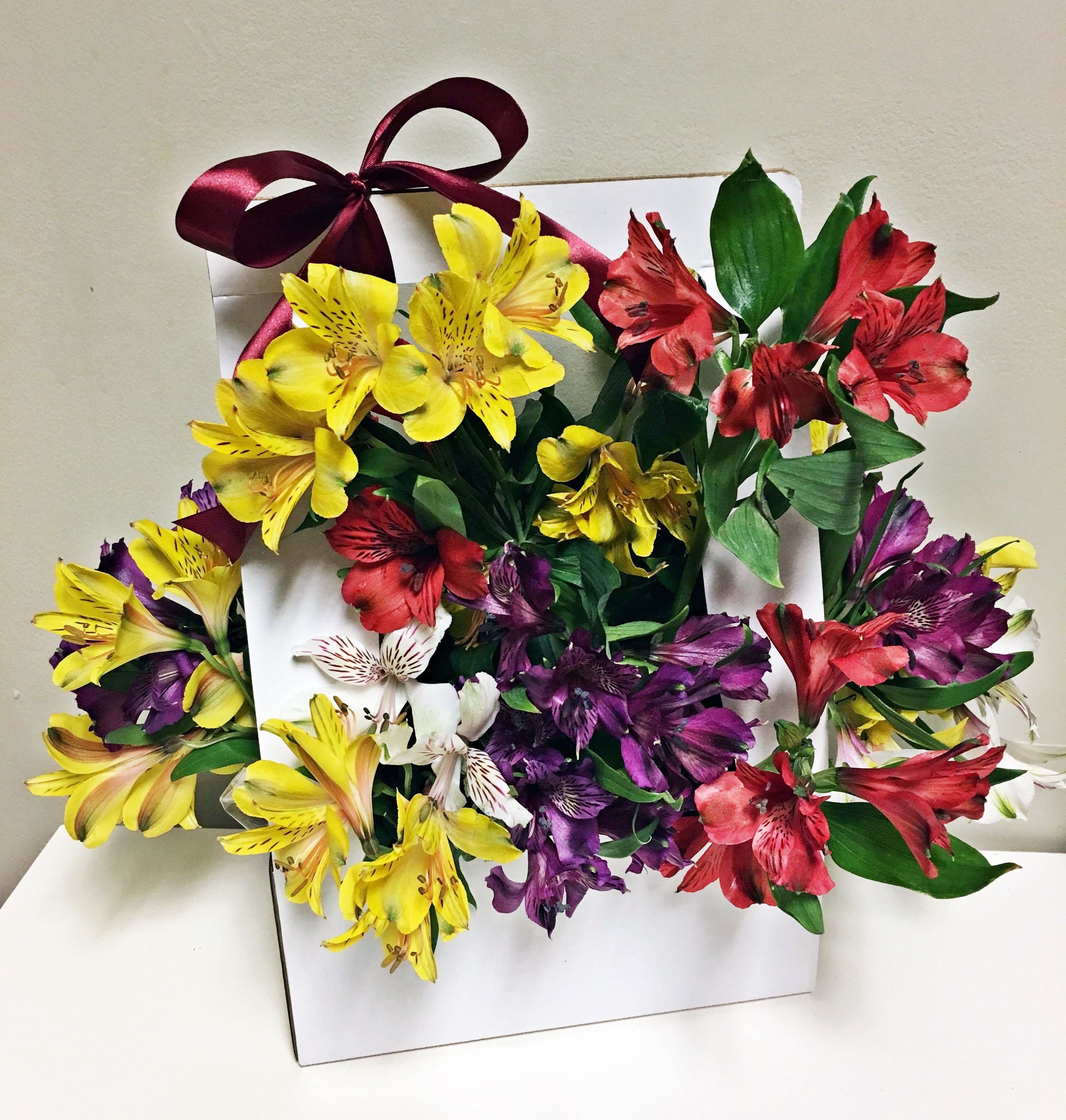 Colorful flowers in a box in Palatine, IL | Flowers by Geo
