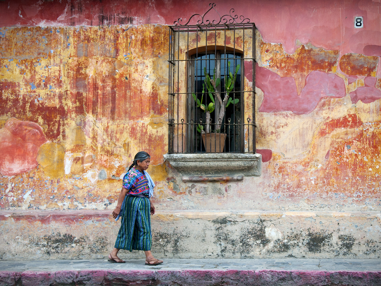 Artists of Mount Tamalpais Woman Walks By Colorful wall, Antigua ...