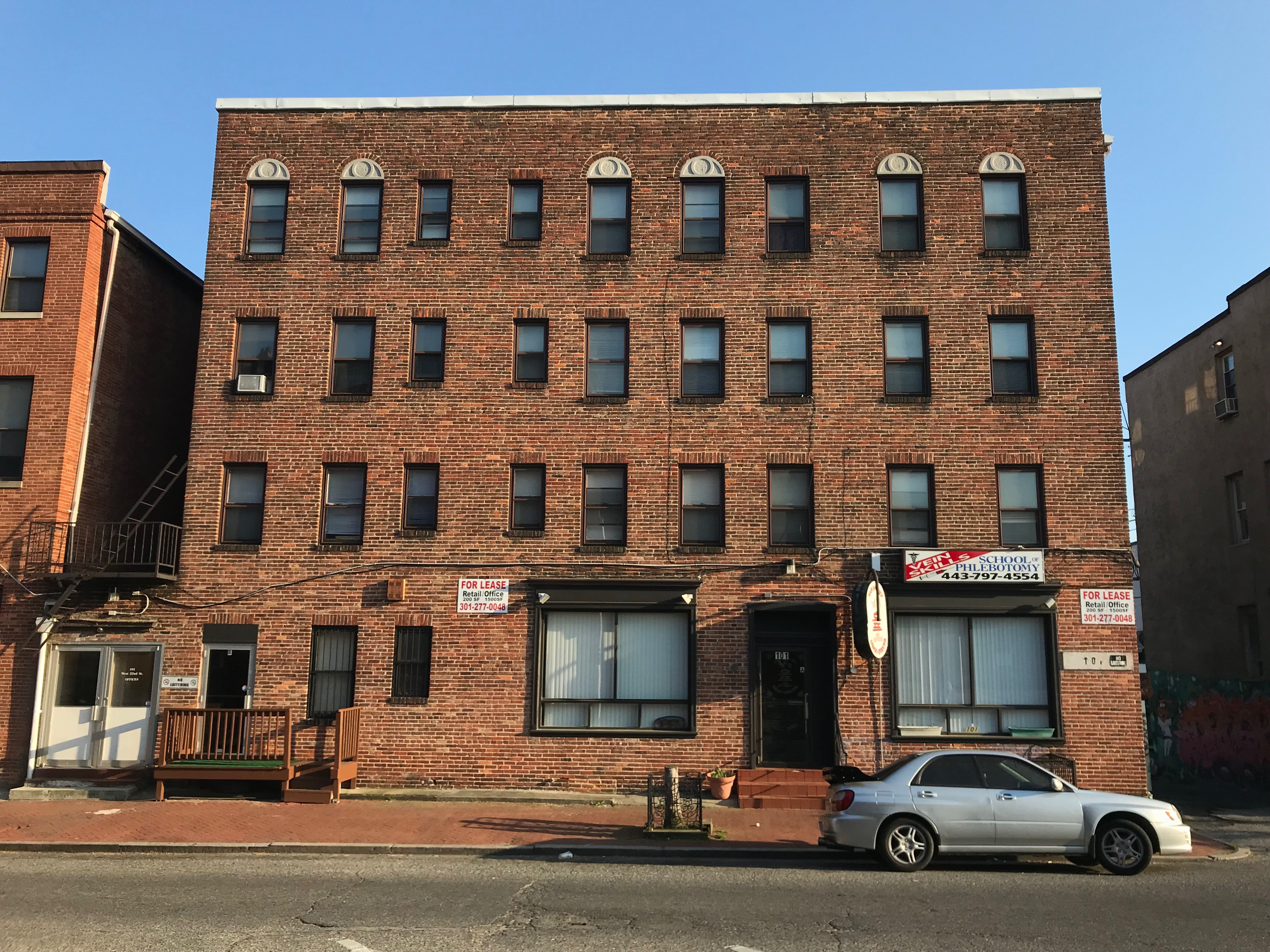 Commercial building, 101 w. 22nd street, baltimore, md 21218 photo