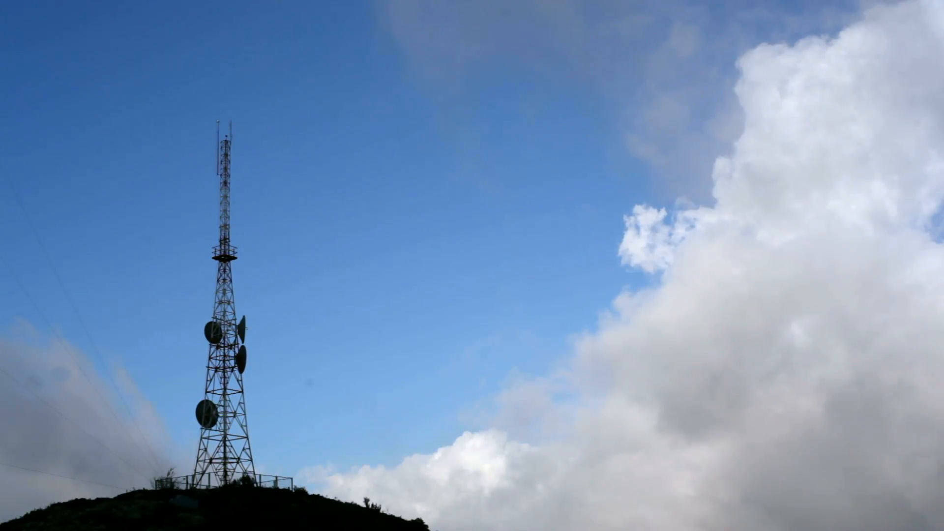 Radio communication antenna towers, mountain peak, clouds sky Stock ...