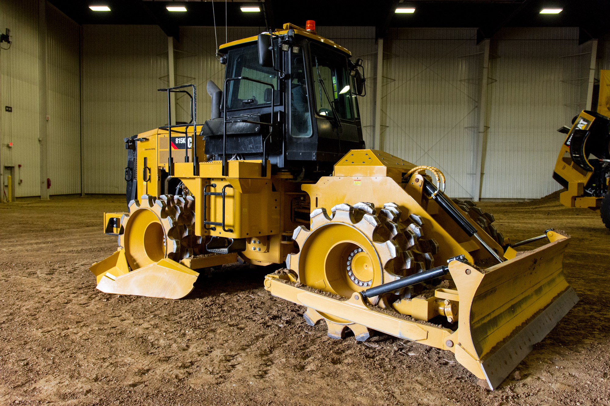 Caterpillar intros 815K soil compactor with improved cab and controls