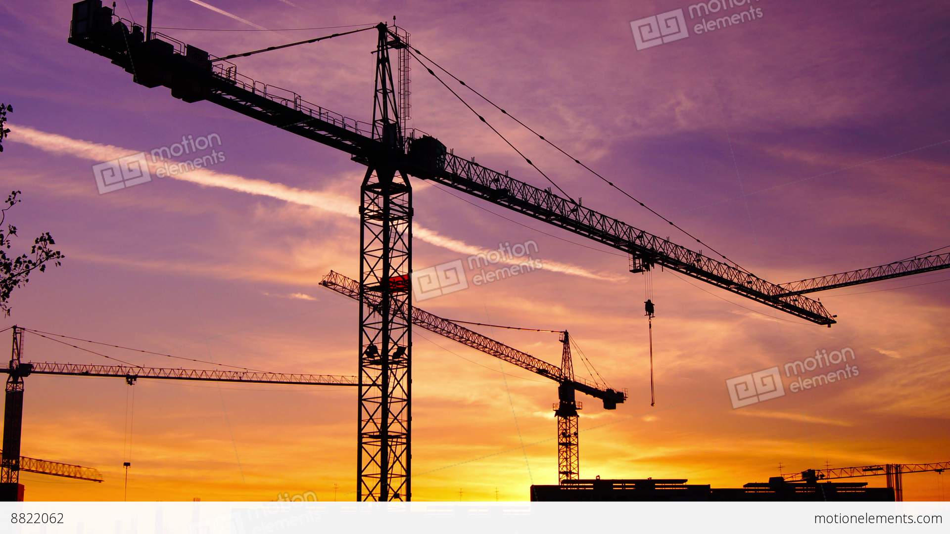 Time Lapse Cranes Working In Construction Site At Dusk, Zoom In ...