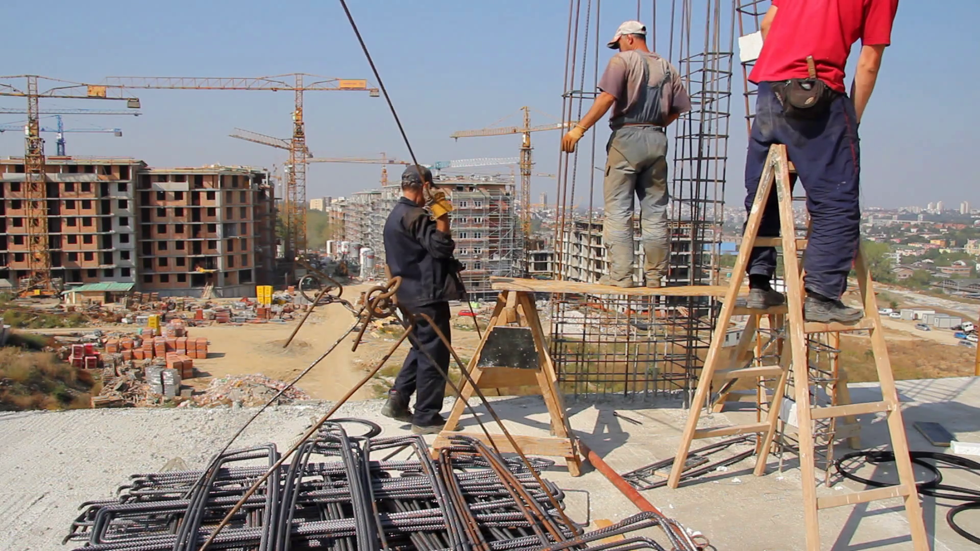 Construction site, men working on a building. Construction engineer ...