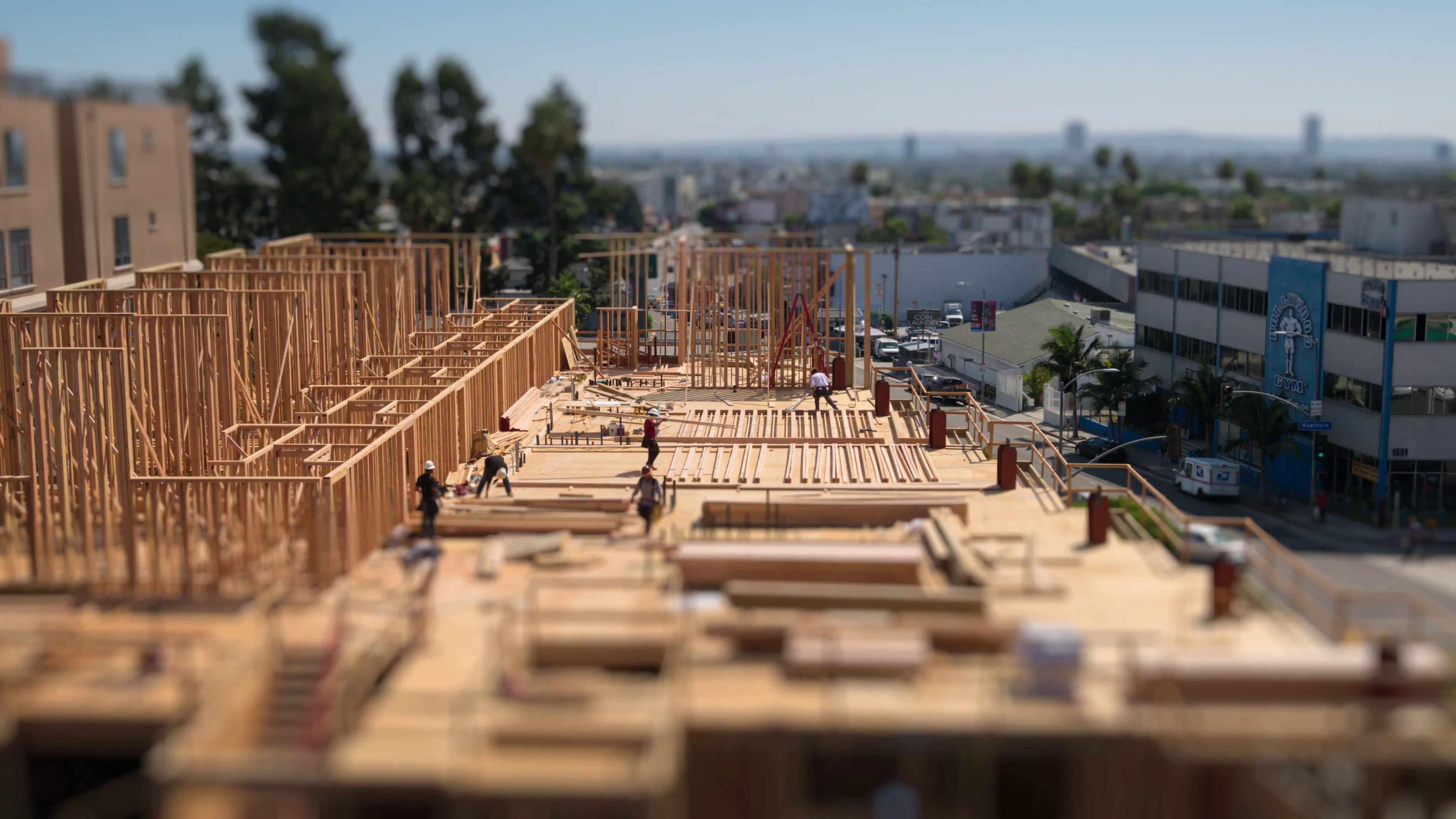 Workers building construction site Los Angeles Tilt shift miniature ...