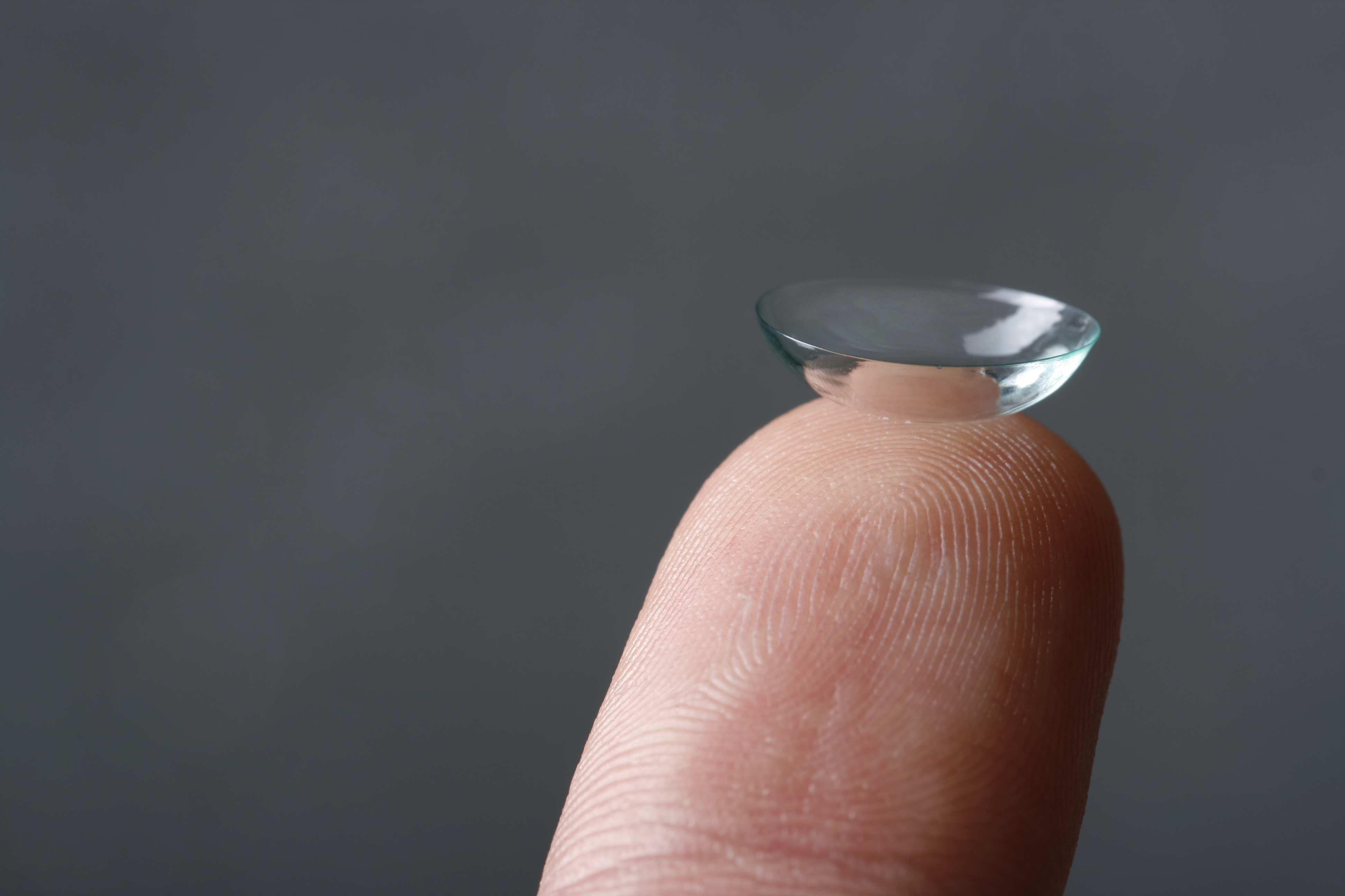 Contact lens on the finger photo
