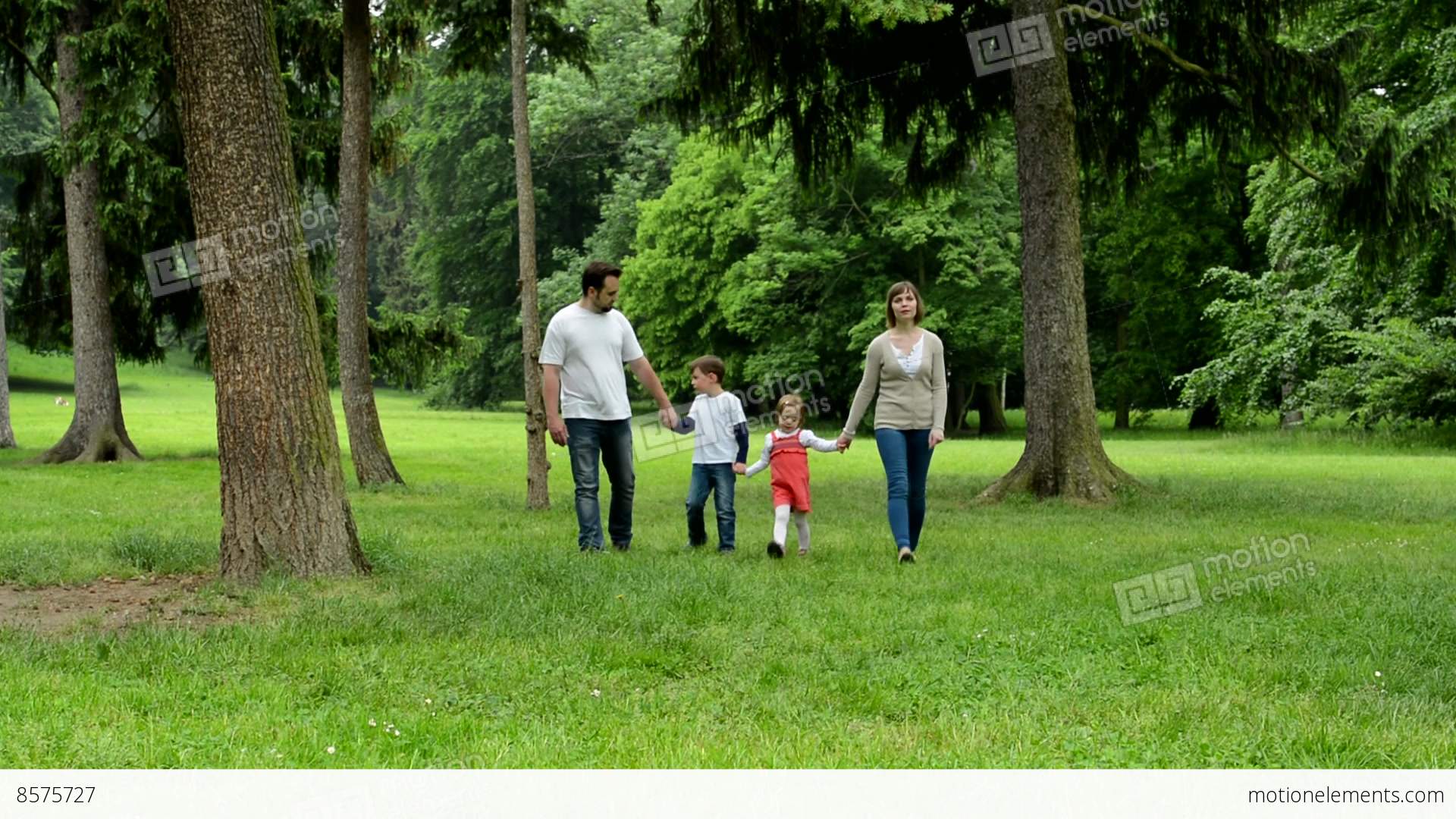 Family (middle Couple In Love, Cute Girl And Small Boy) Walking In ...