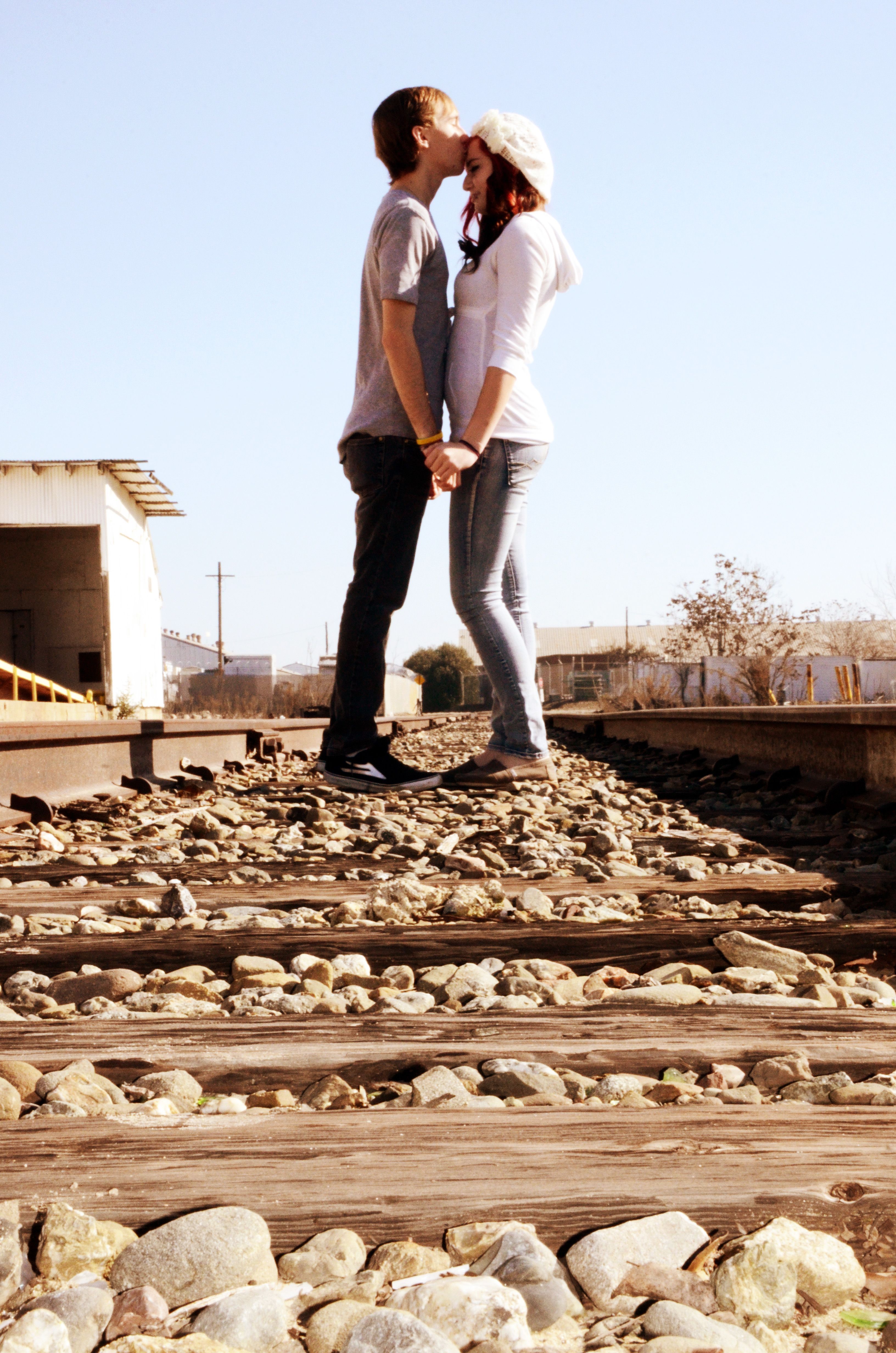 Couple Portrait on the railroad tracks Mylestone Photography Photo ...