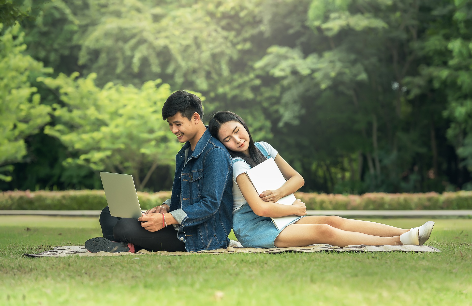 Couple using laptop photo