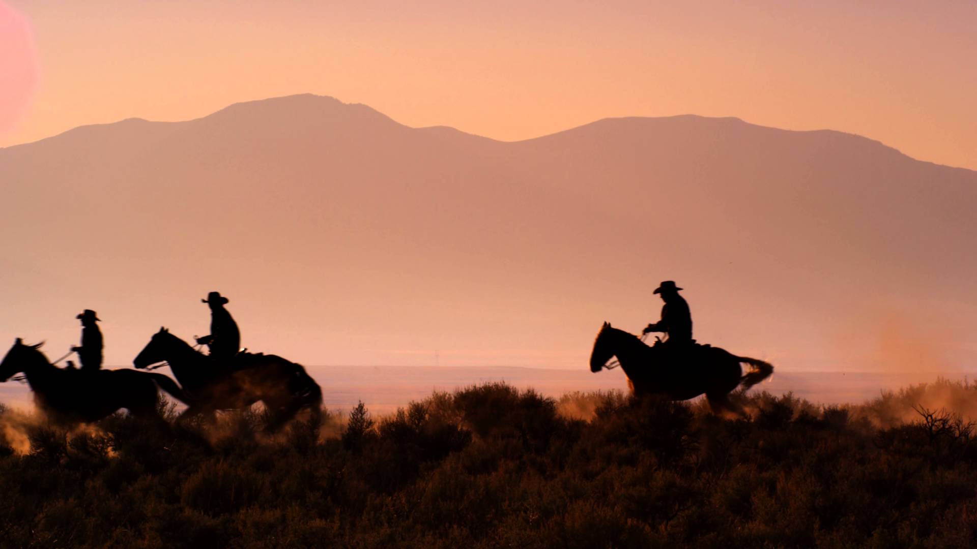Slow Motion Silhouette Shot Of Cowboys Galloping Horses In 4K ...