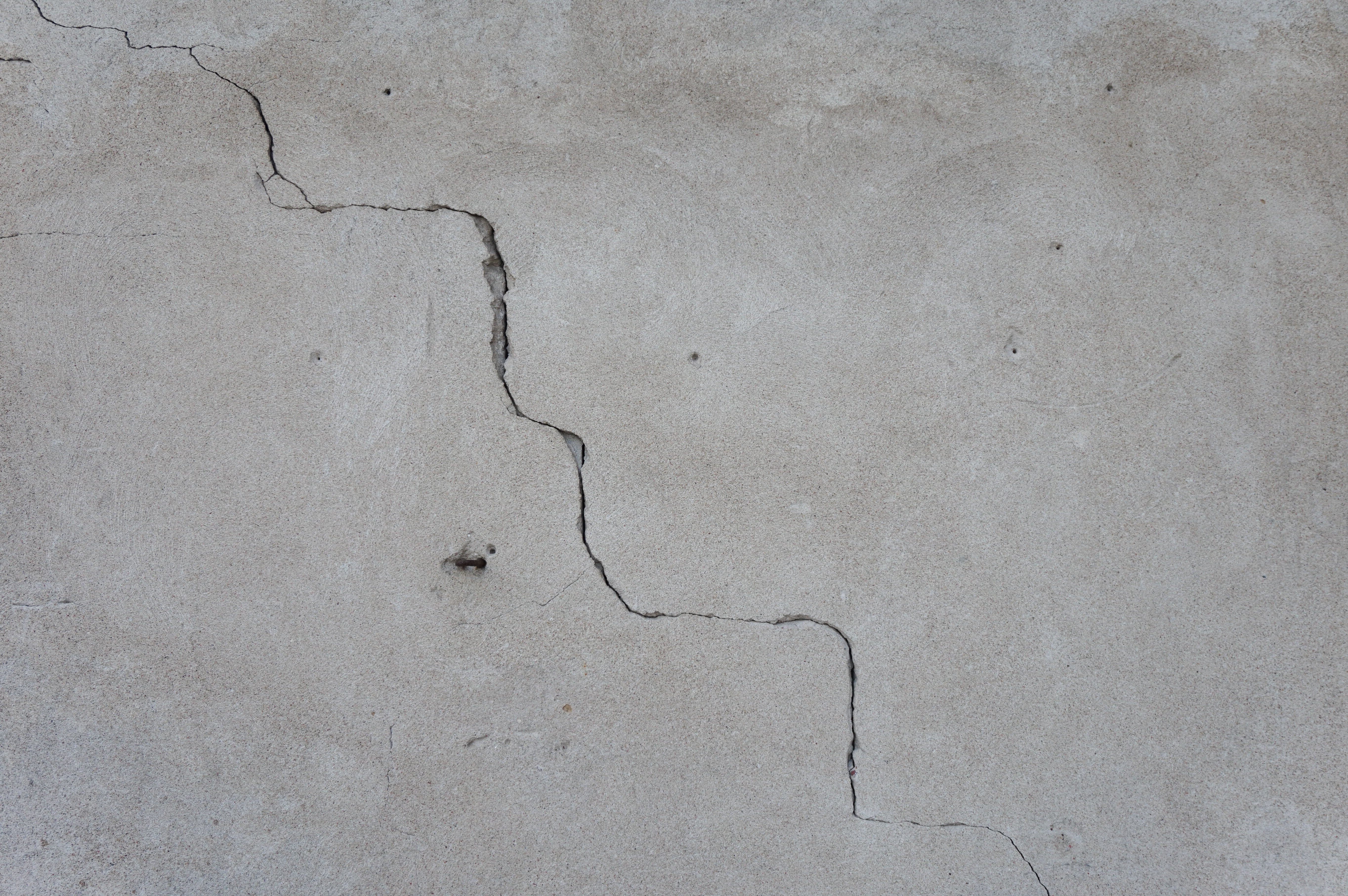 Cracked concrete wall - Concrete - Texturify - Free textures