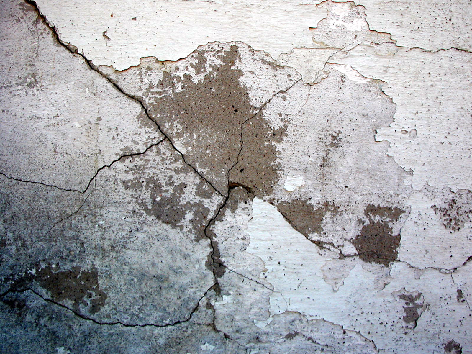 Серые трещины. Трещина в стене. Трещины в бетоне. Трещины на штукатурке. Текстура стены.