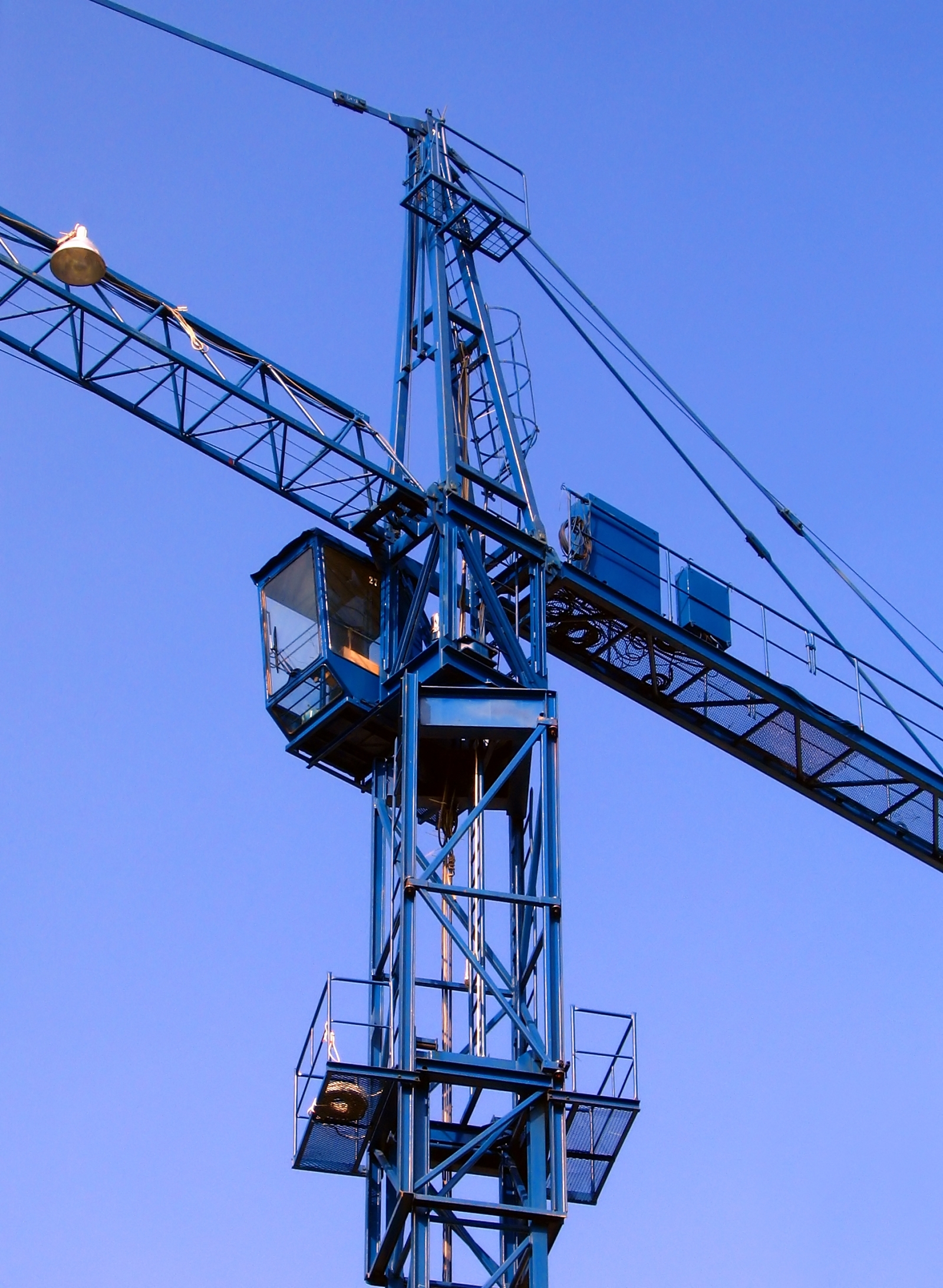 Crane against a blue sky photo