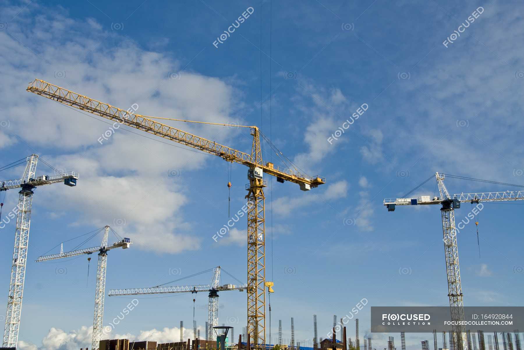 Cranes working during daytime — Stock Photo | #164920844
