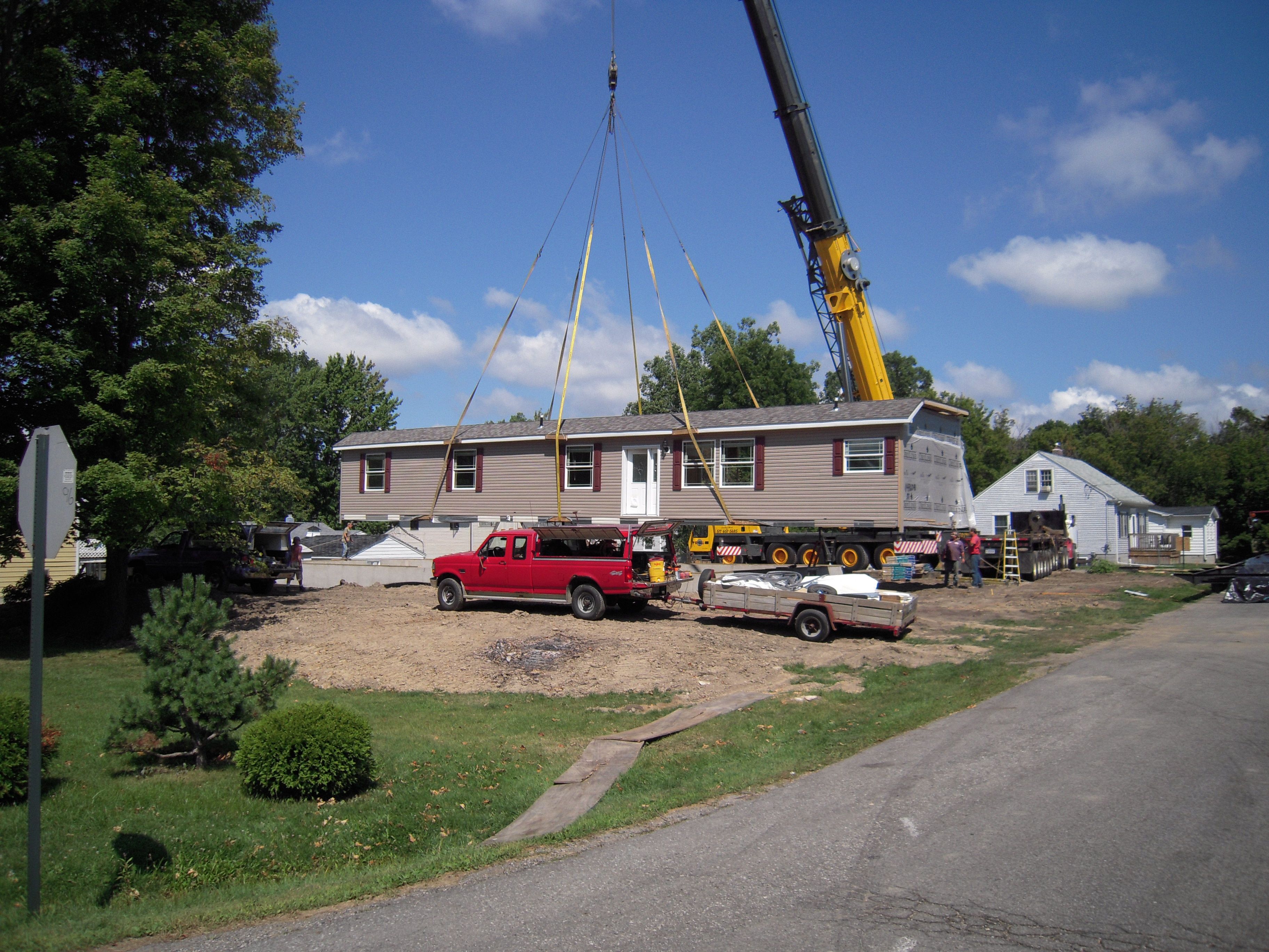 Here's a crane set of a 76' long, 9' sidewall modular home with a 7 ...