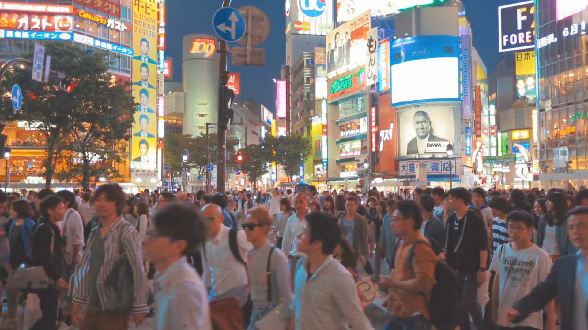 Japanese people crossing the street outside the famously crowded ...