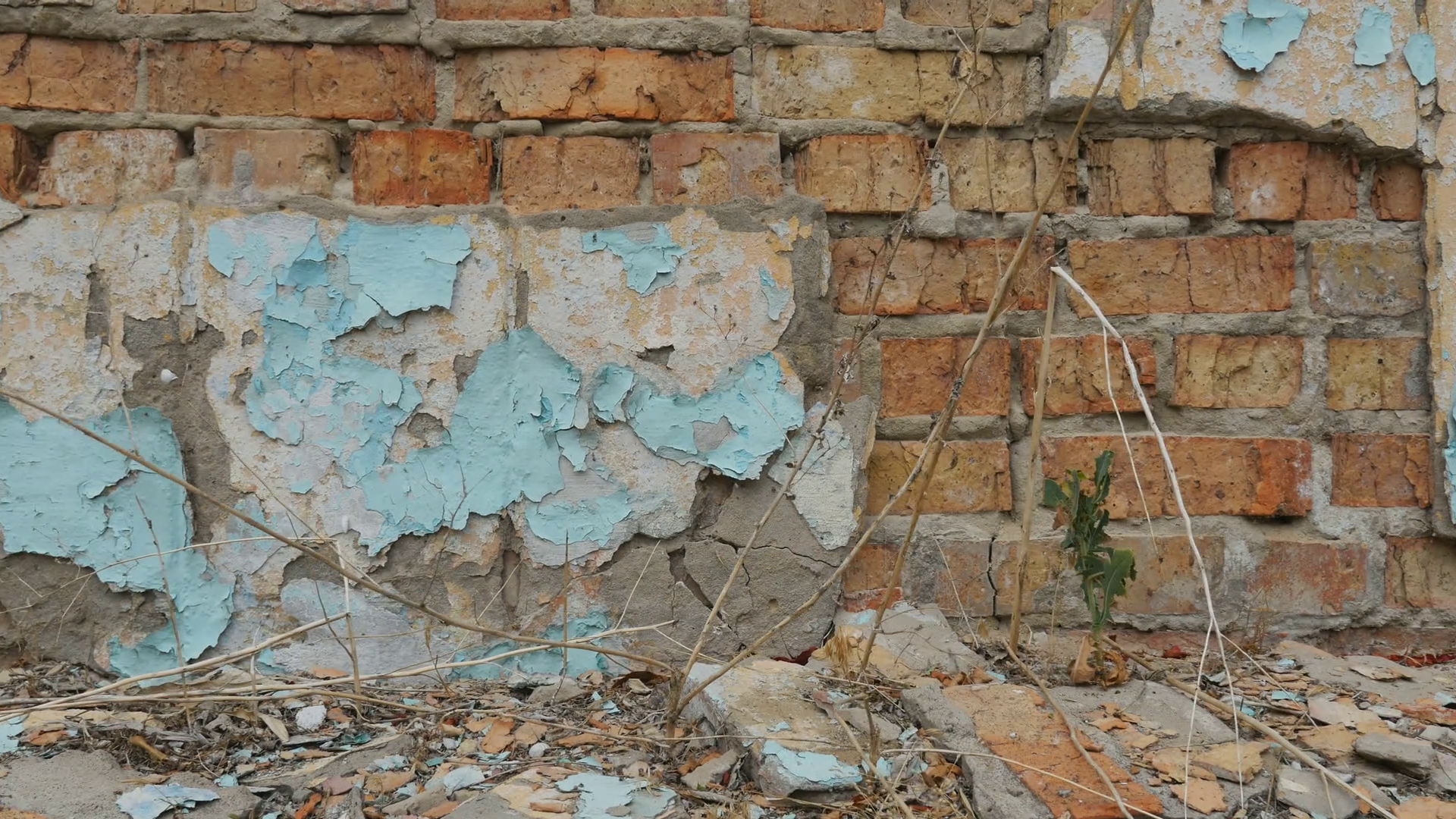 Brick wall with crumbling plaster on old building. Stock Video ...
