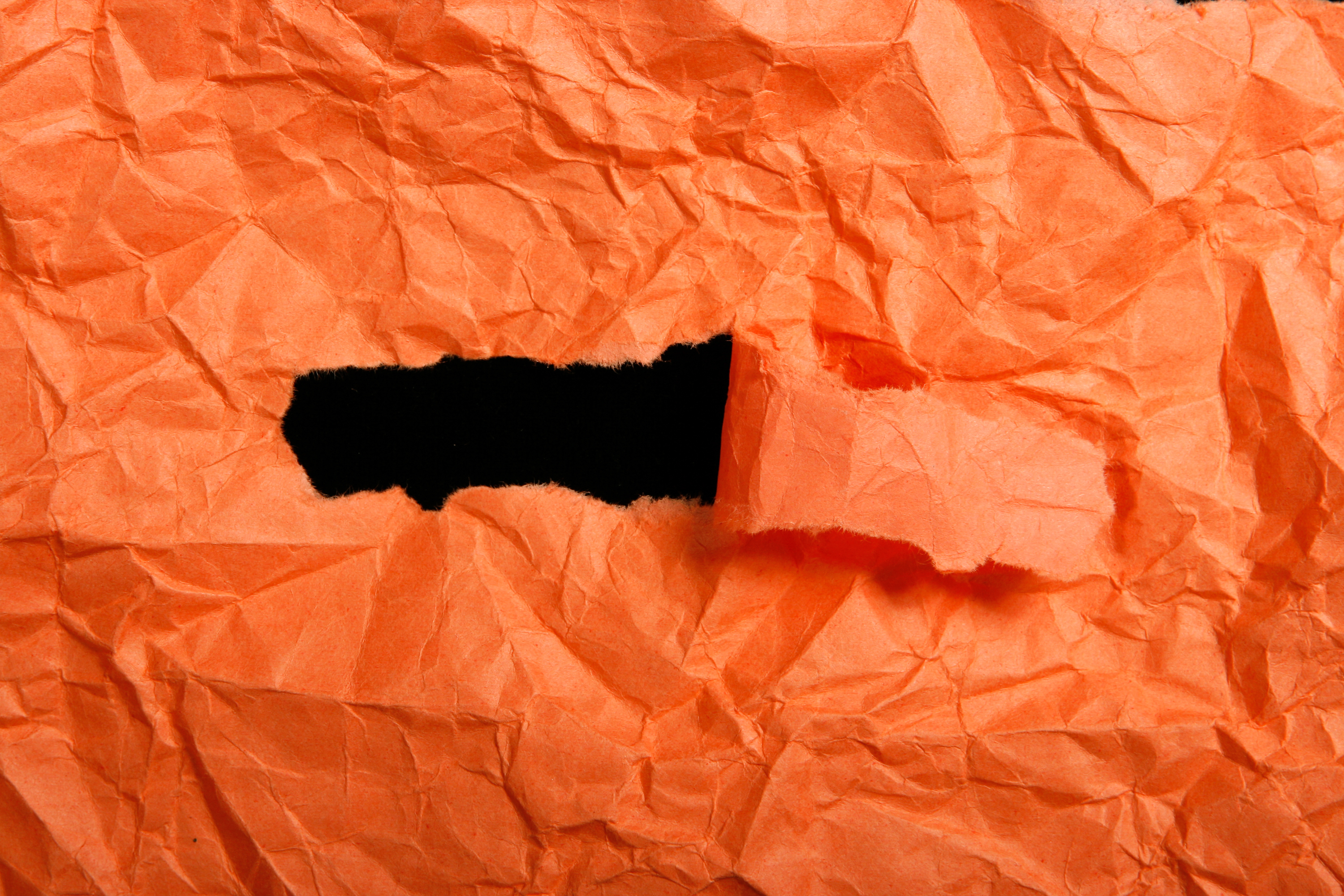 Оранжевая смятая бумага