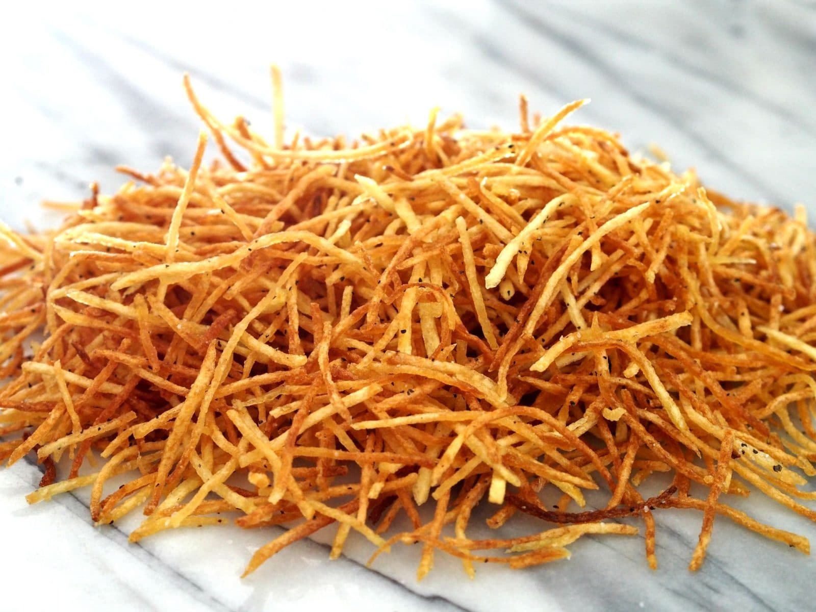 Crispy Crunchy Shoestring Potatoes - Simply Sated