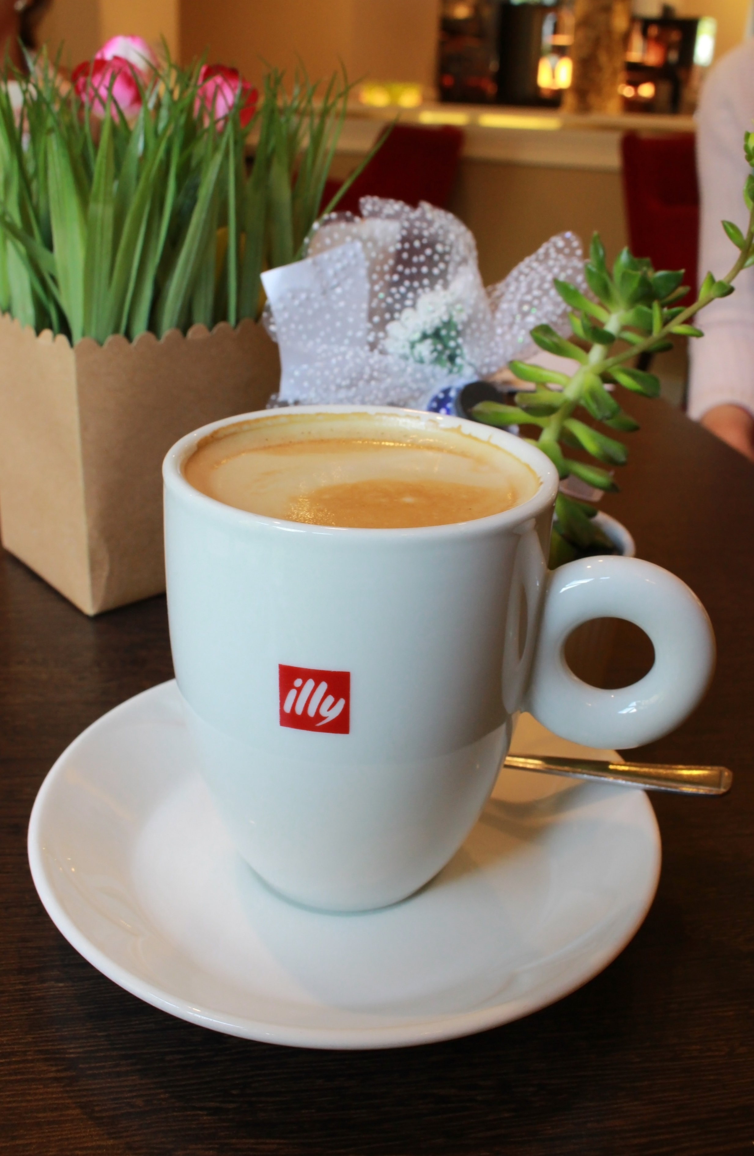 Cup of illy branded coffee photo